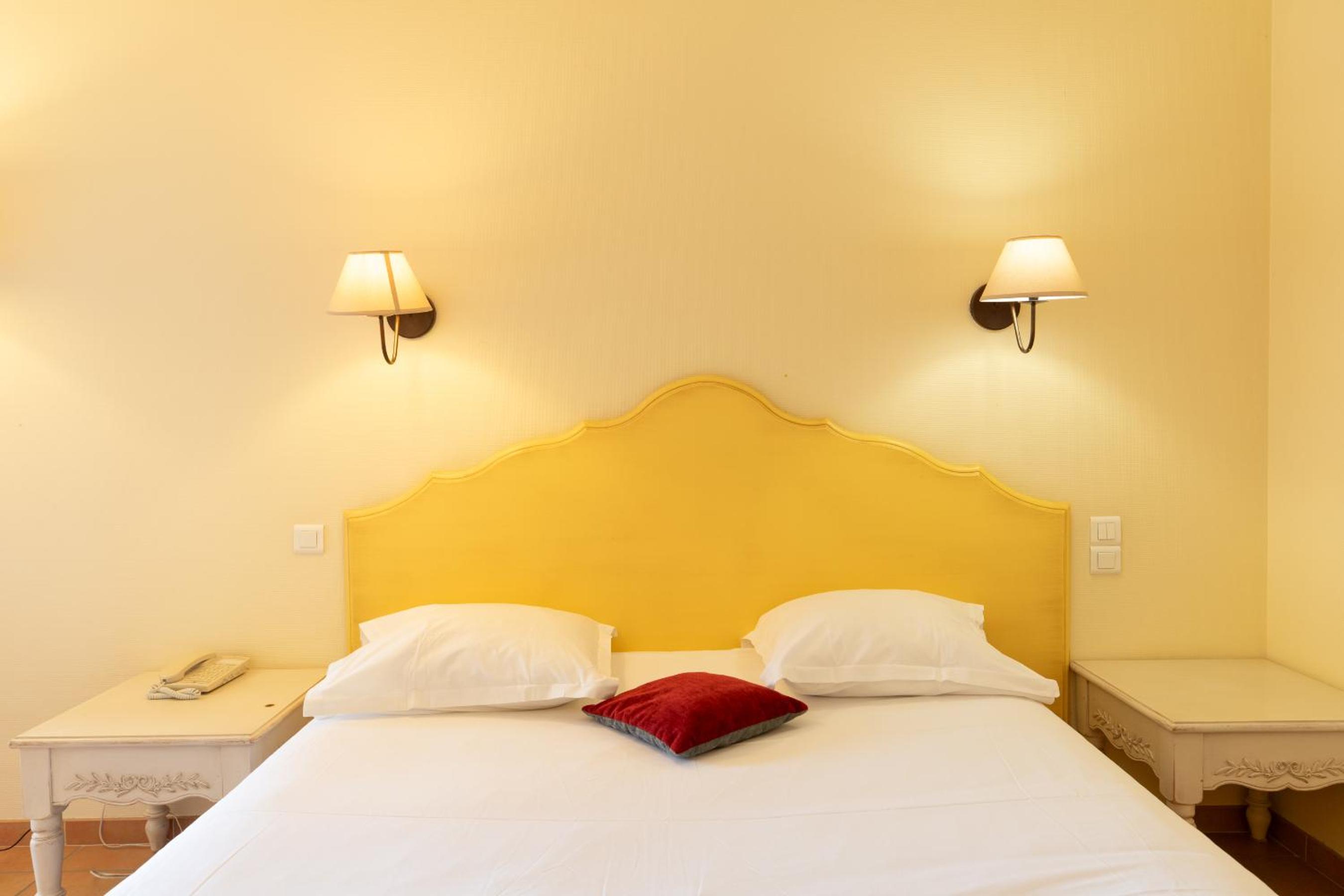Superior Quadruple Room with One King and Two Single Beds - Private Patio