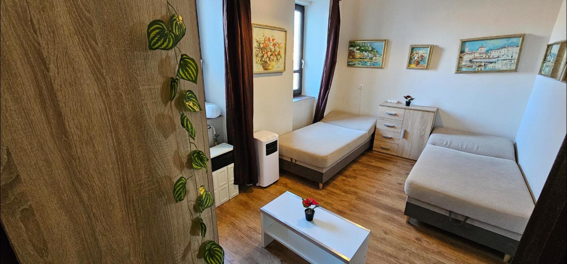 Three-Bedroom Apartment - Photo 19