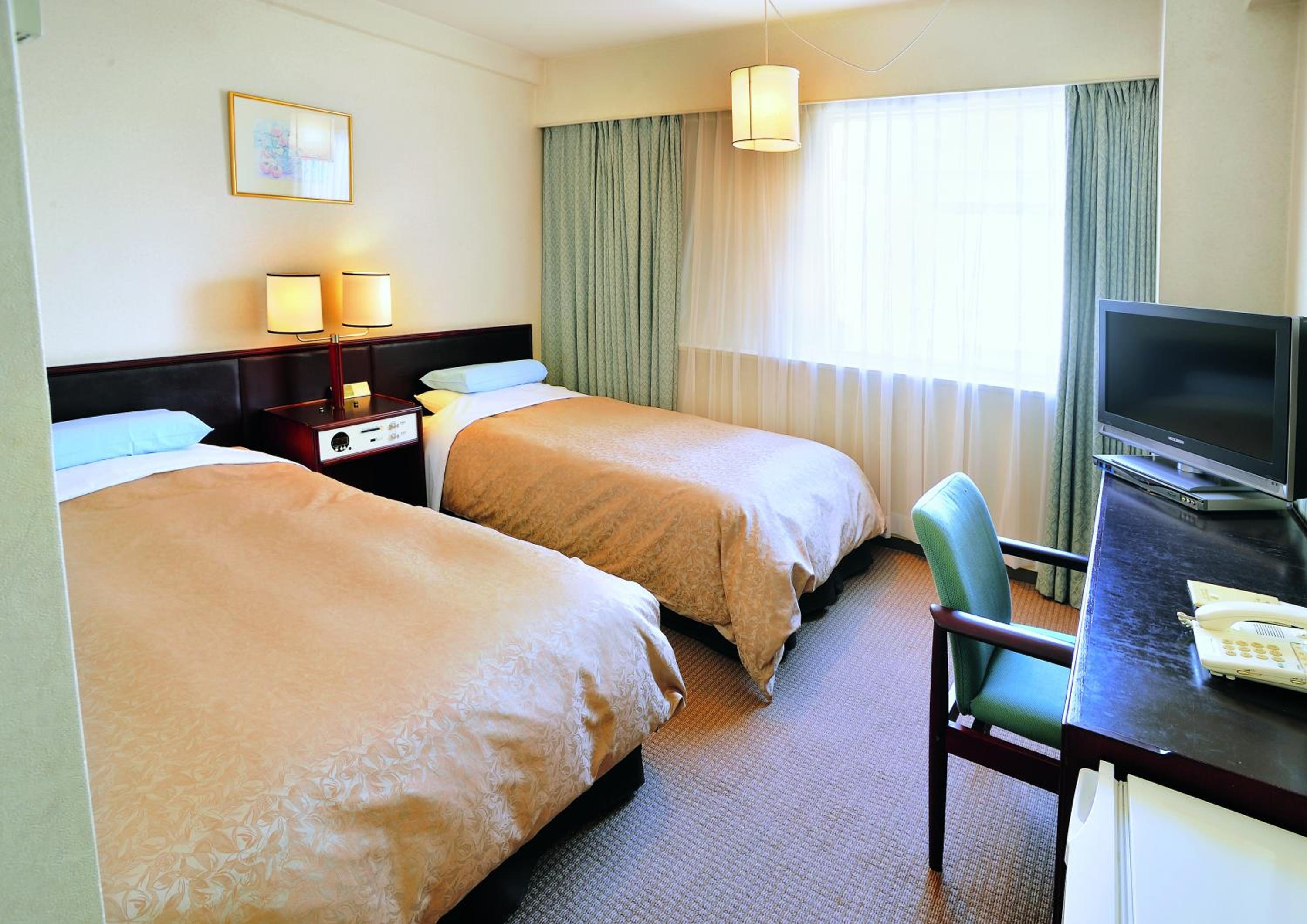 Economy Twin Room - Non-Smoking - Photo 1
