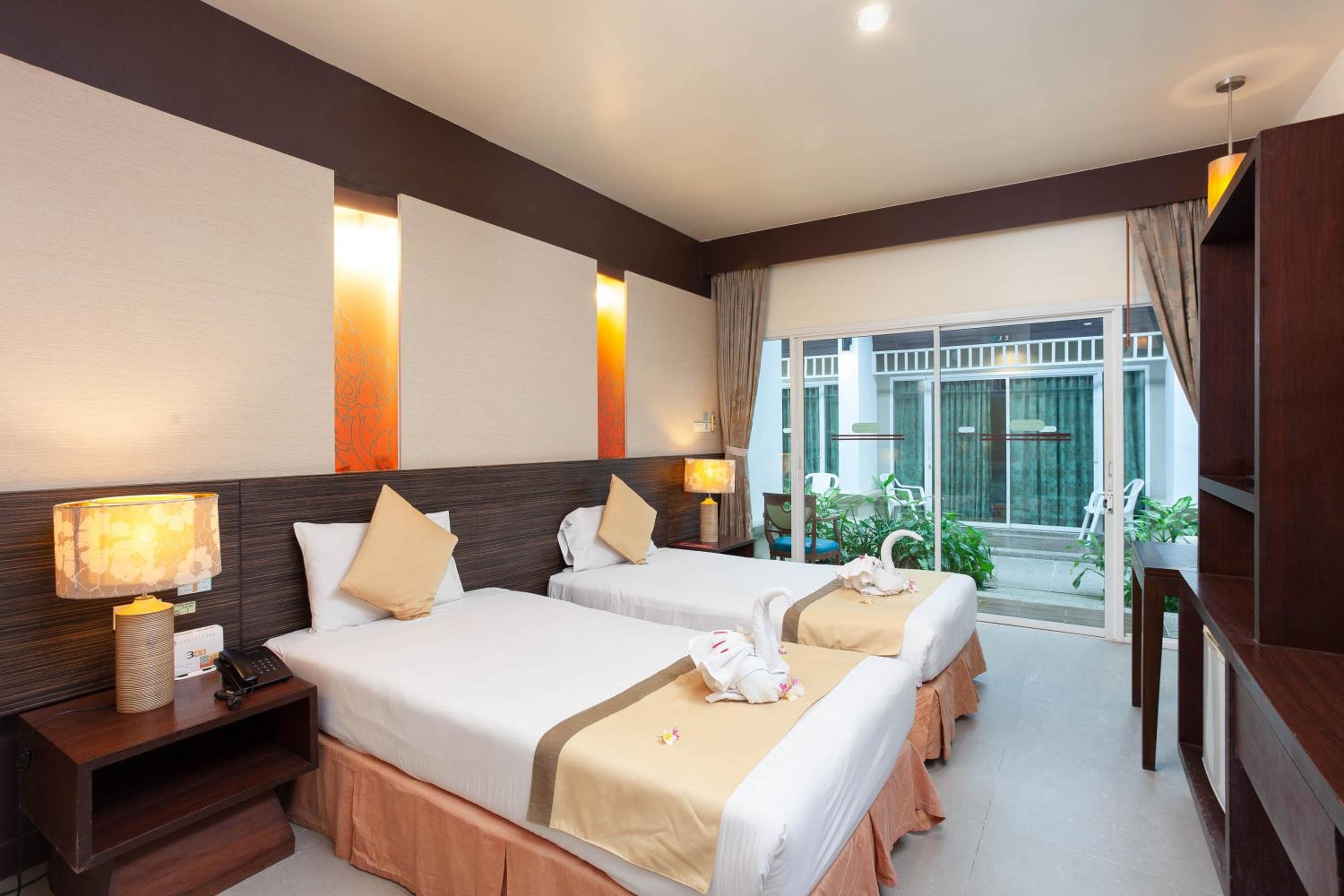 Courtyard Studio - Twin Bed - Photo 1