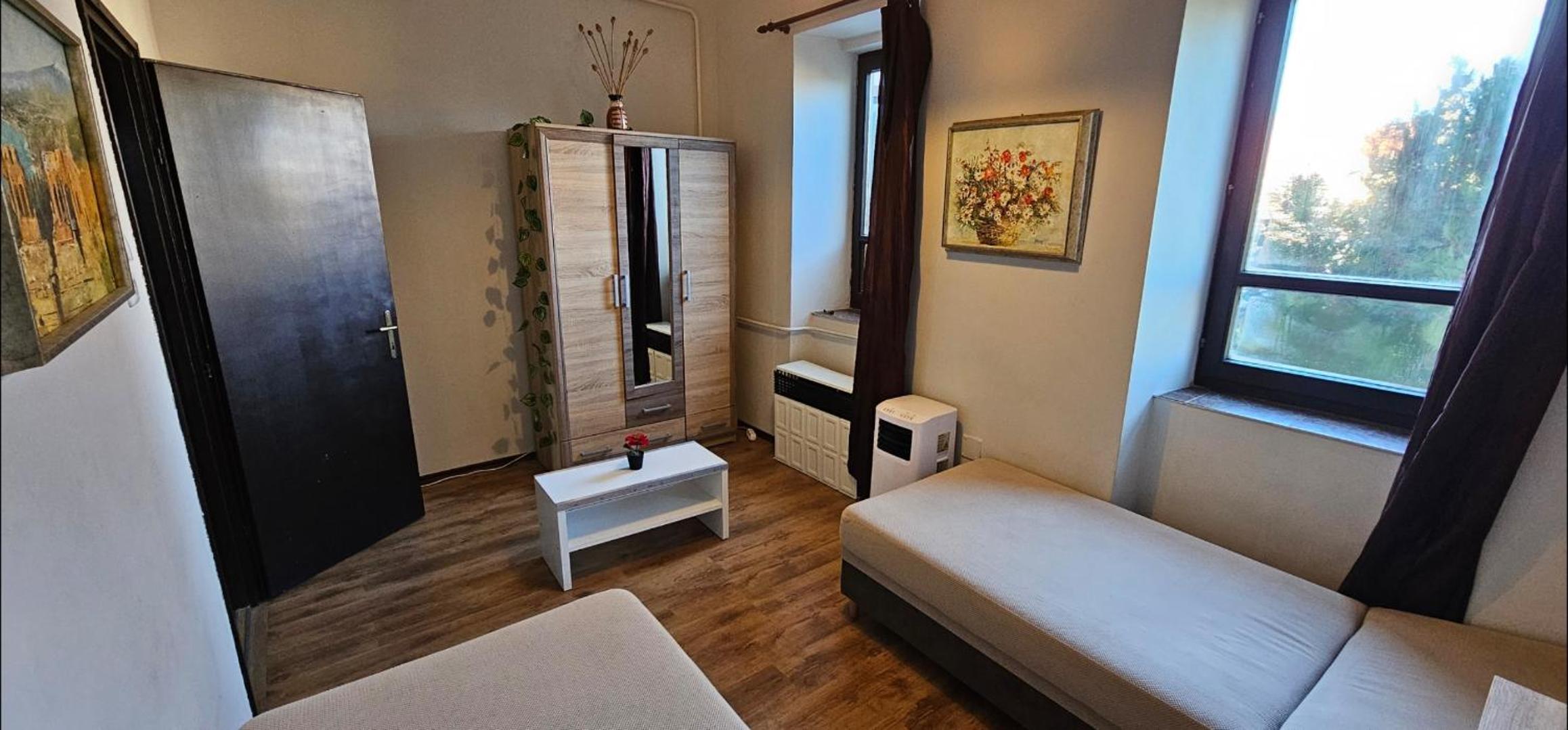 Three-Bedroom Apartment - Photo 40