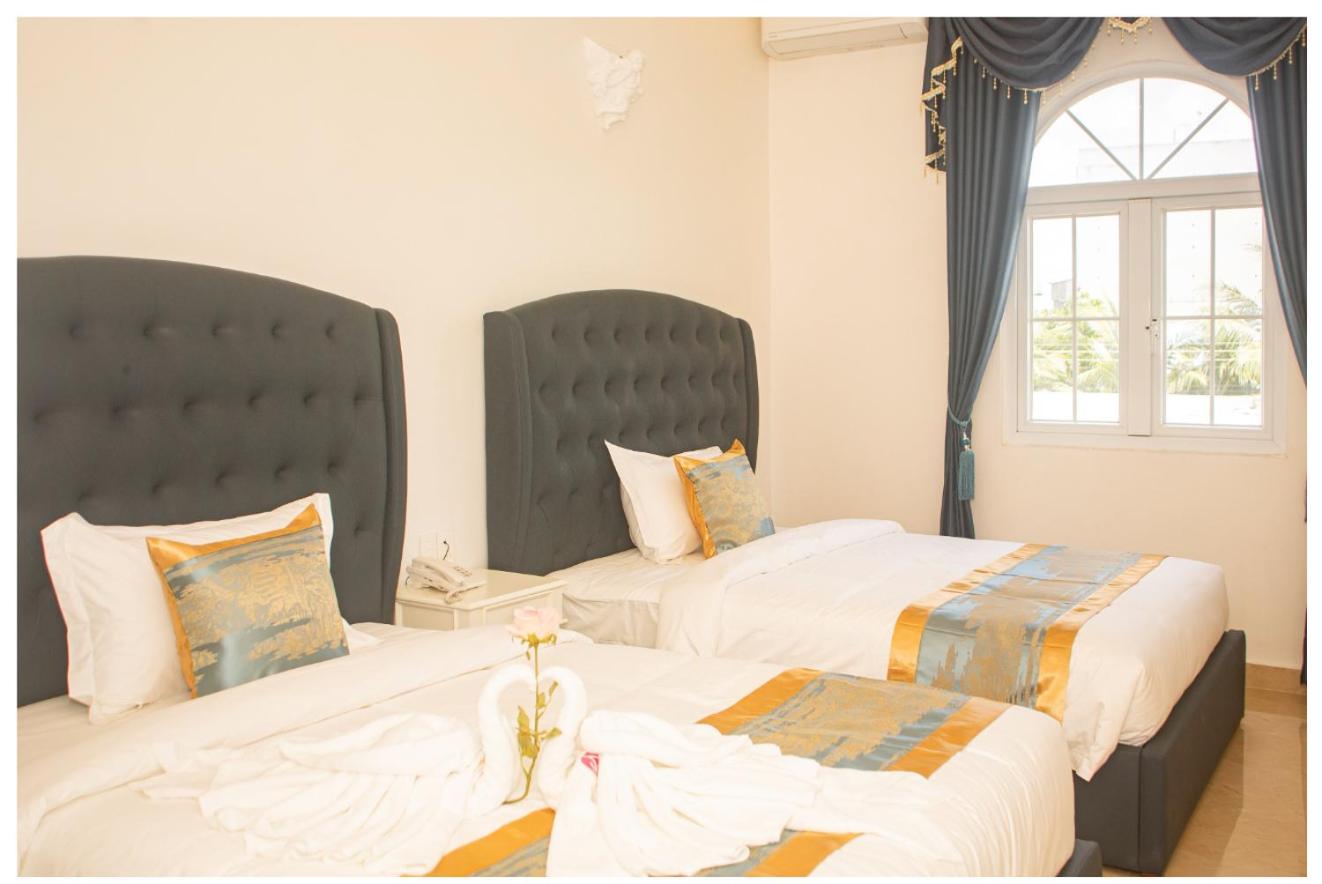 Twin Room - Photo 1