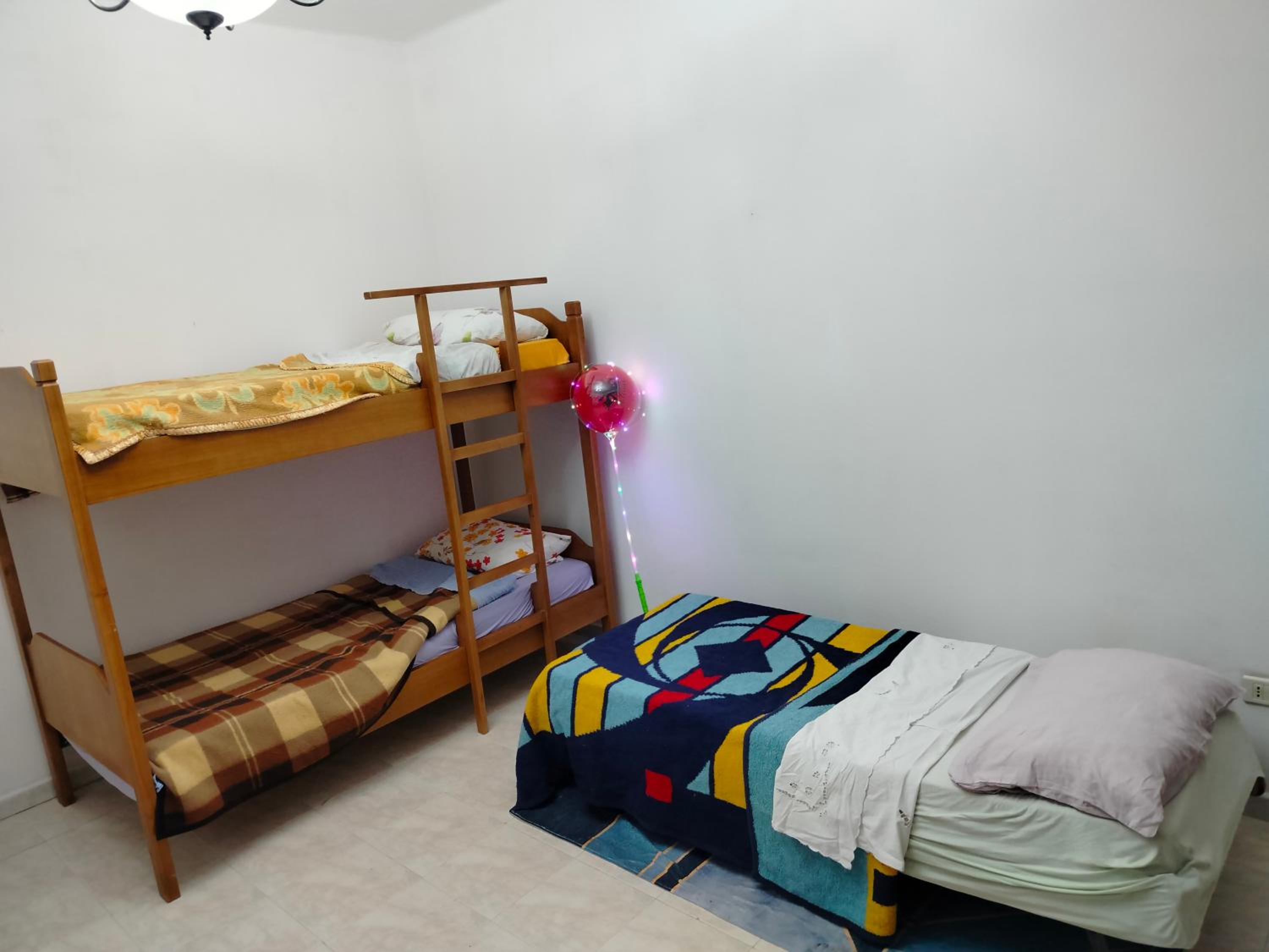 Single Bed In Dormitory Room