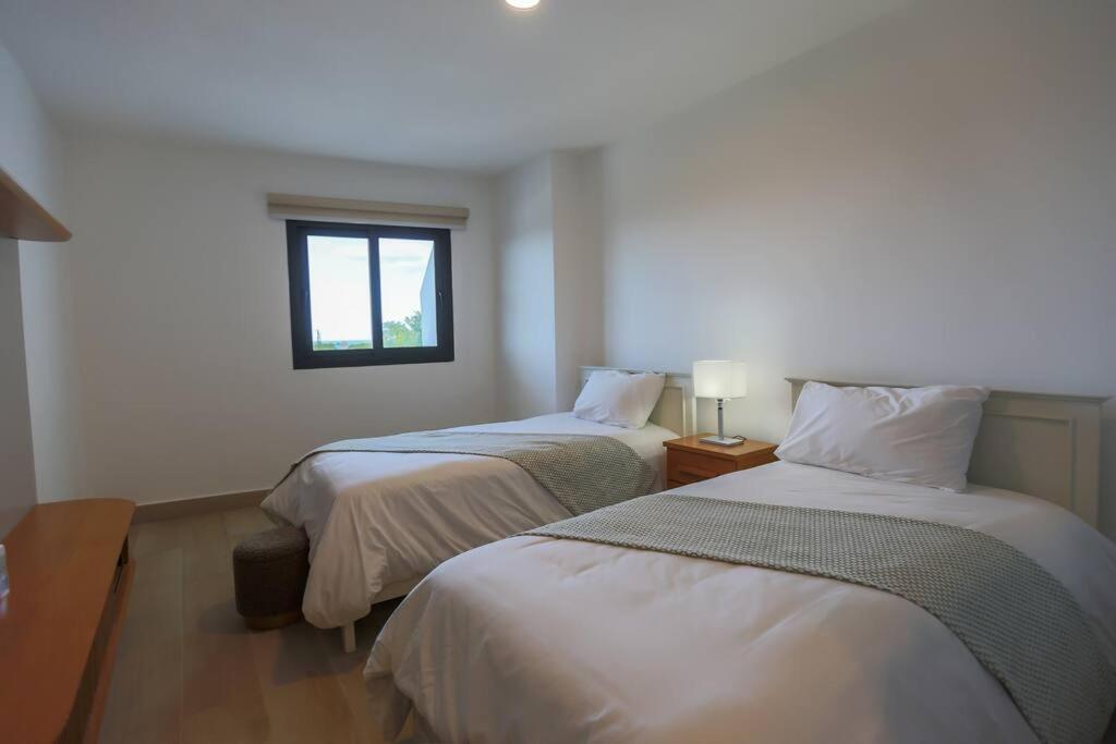 Three-Bedroom Apartment photo 2