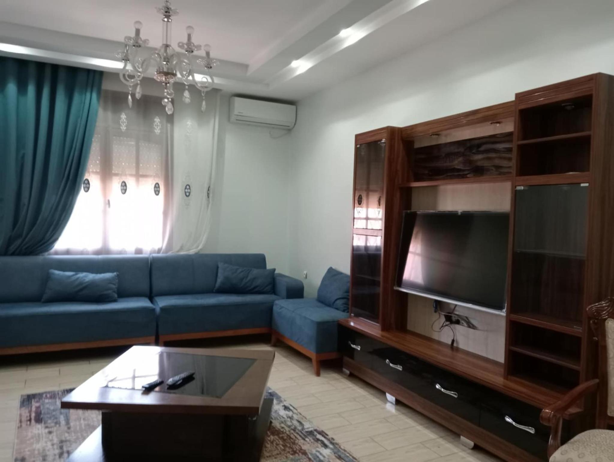 Three-Bedroom Apartment photo 1