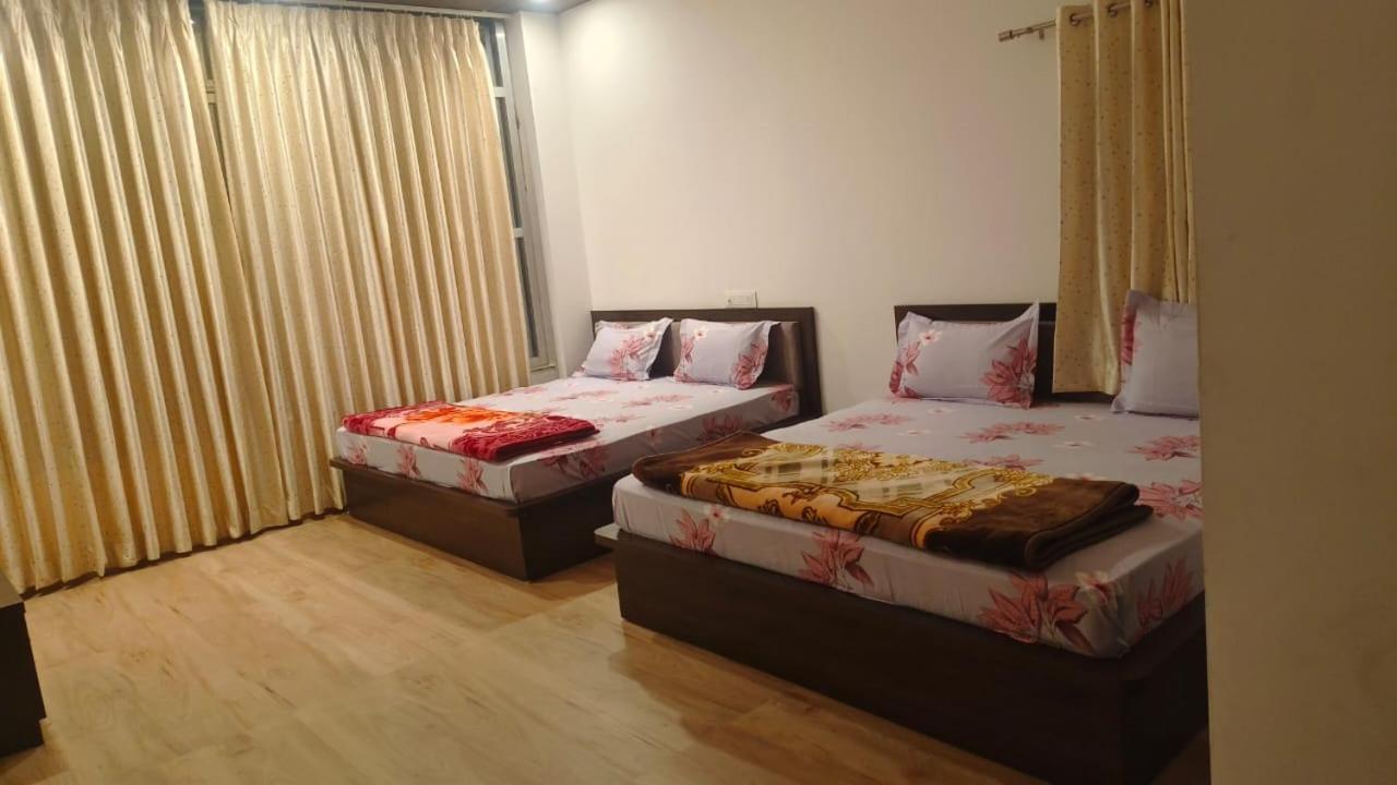 Deluxe Queen Room With Two Queen Beds photo 3