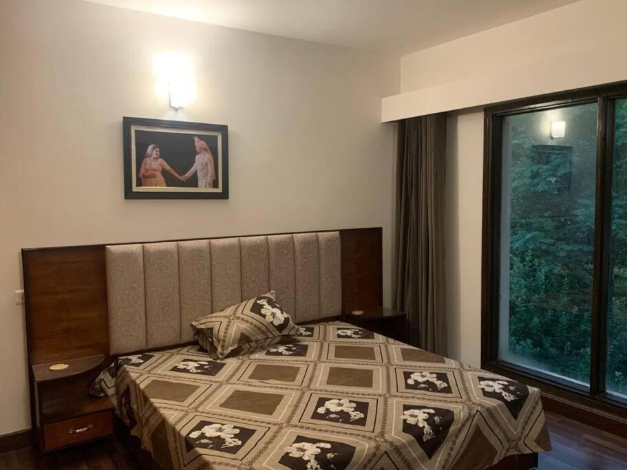 Three-Bedroom Apartment photo 1