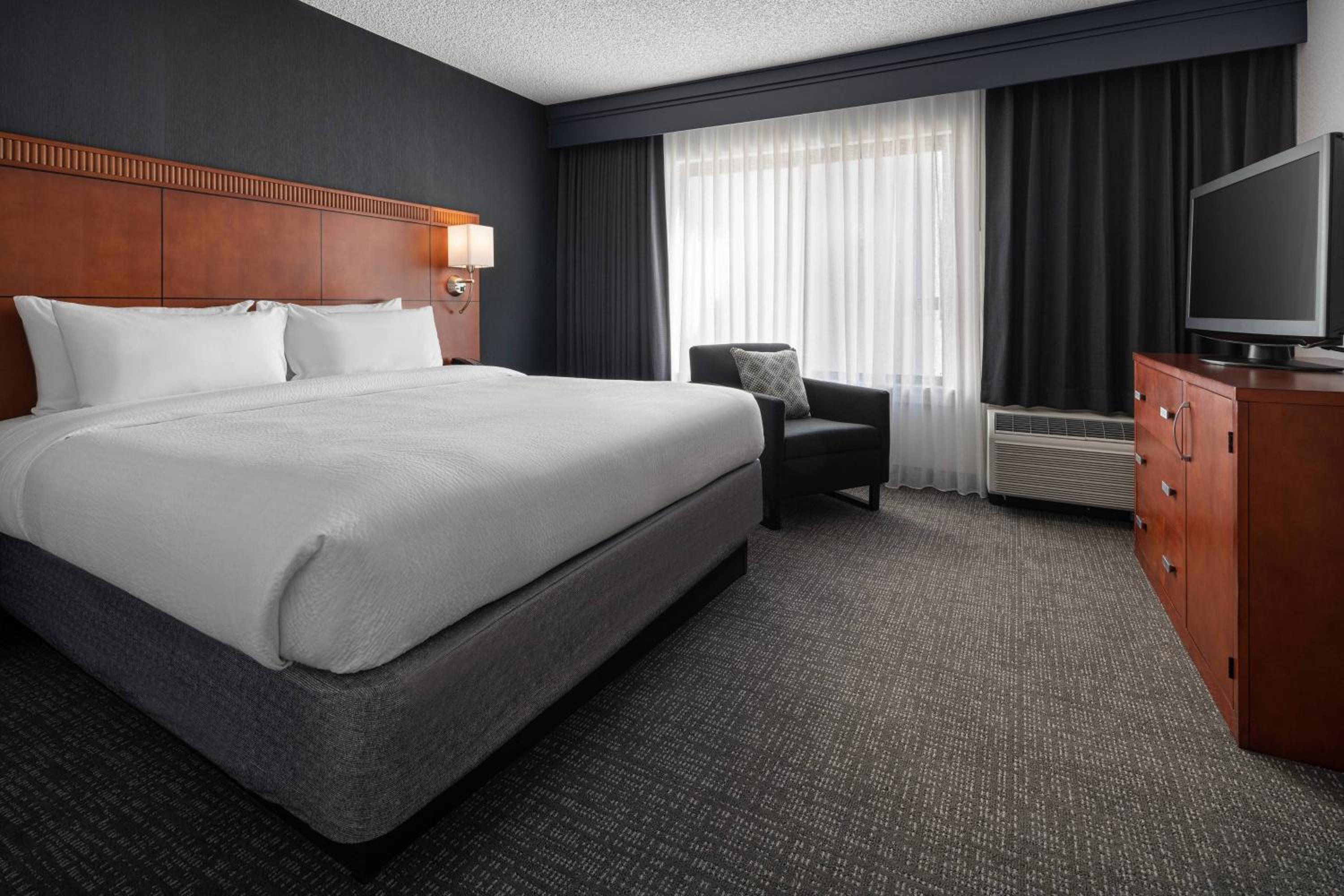 King Suite with Sofa Bed and Adapted Tub - Mobility Accessible photo 1