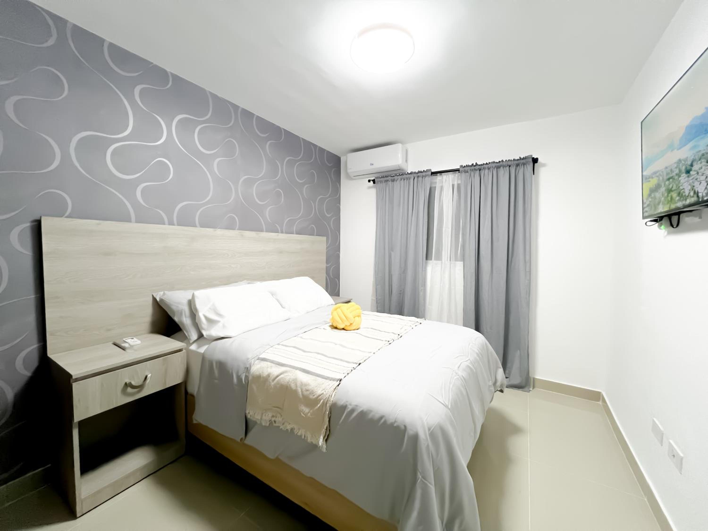 Three-Bedroom Apartment photo 1