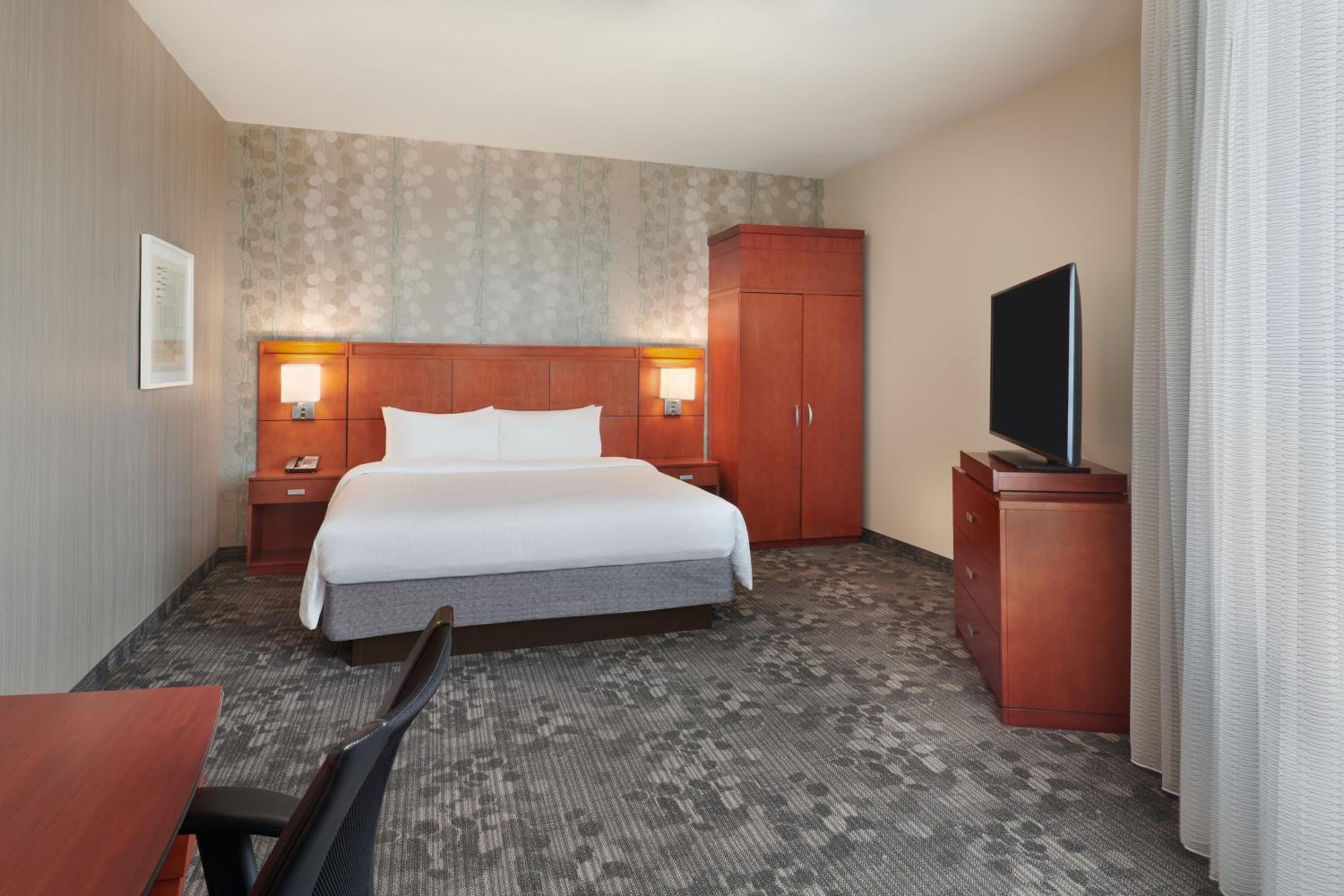 One-Bedroom King Suite with Sofa Bed and City View