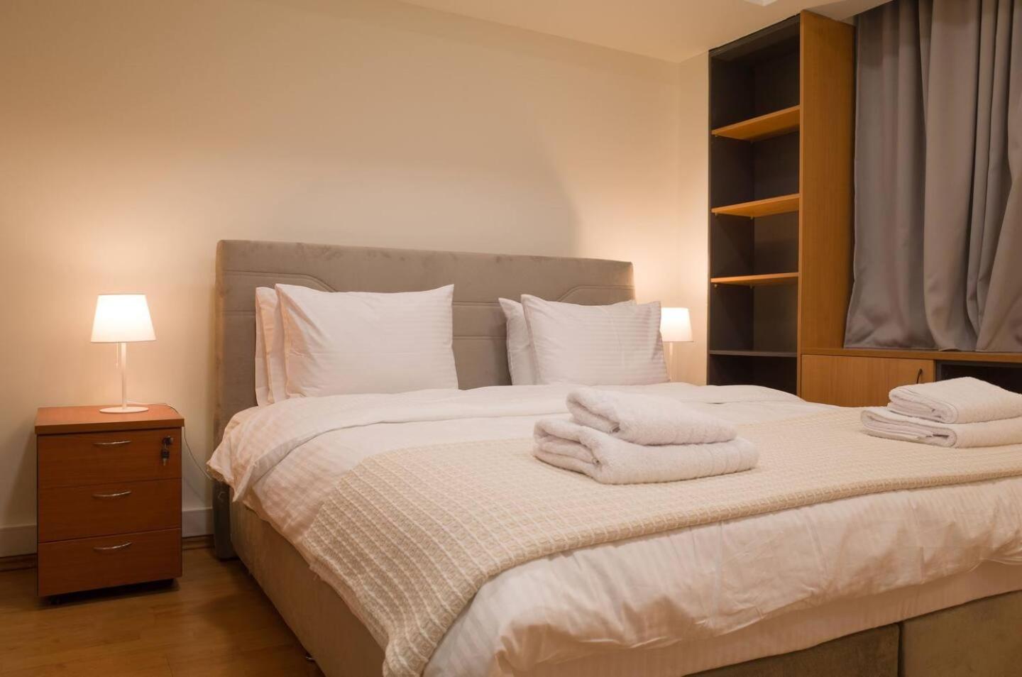 One-Bedroom Apartment with Balcony and City View