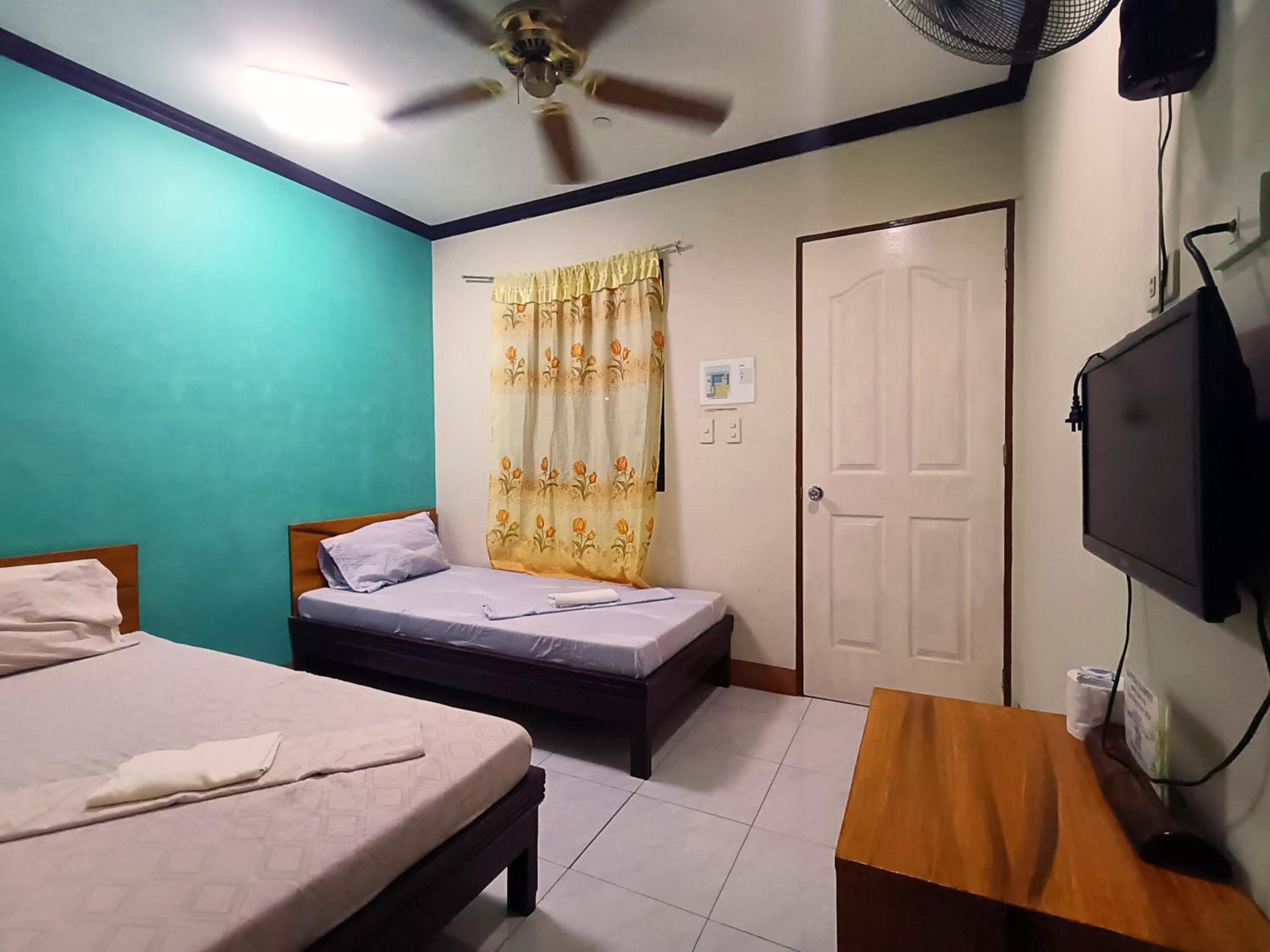 Fan Twin Room with No Hot Shower photo 2