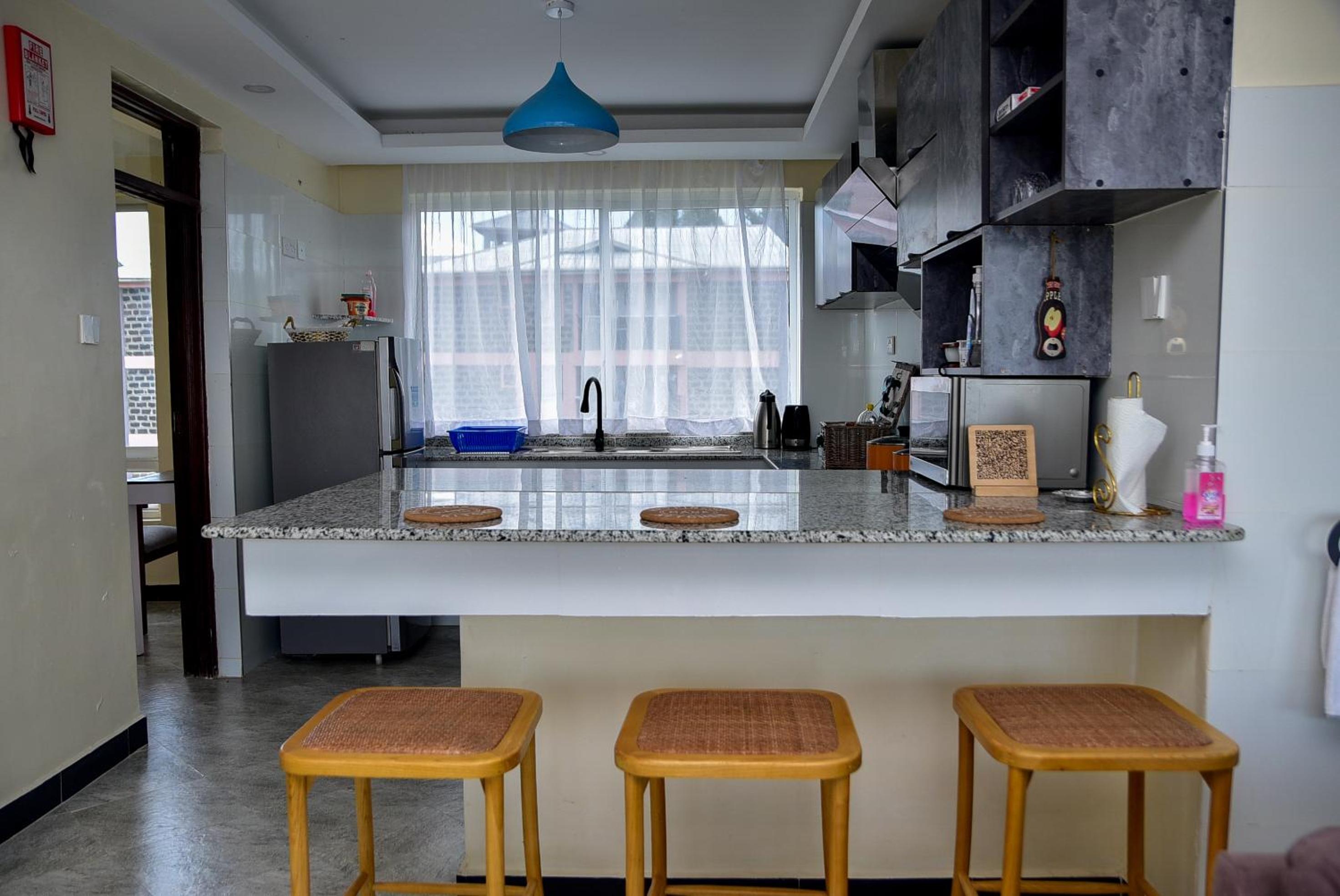 Three-Bedroom Apartment photo 2