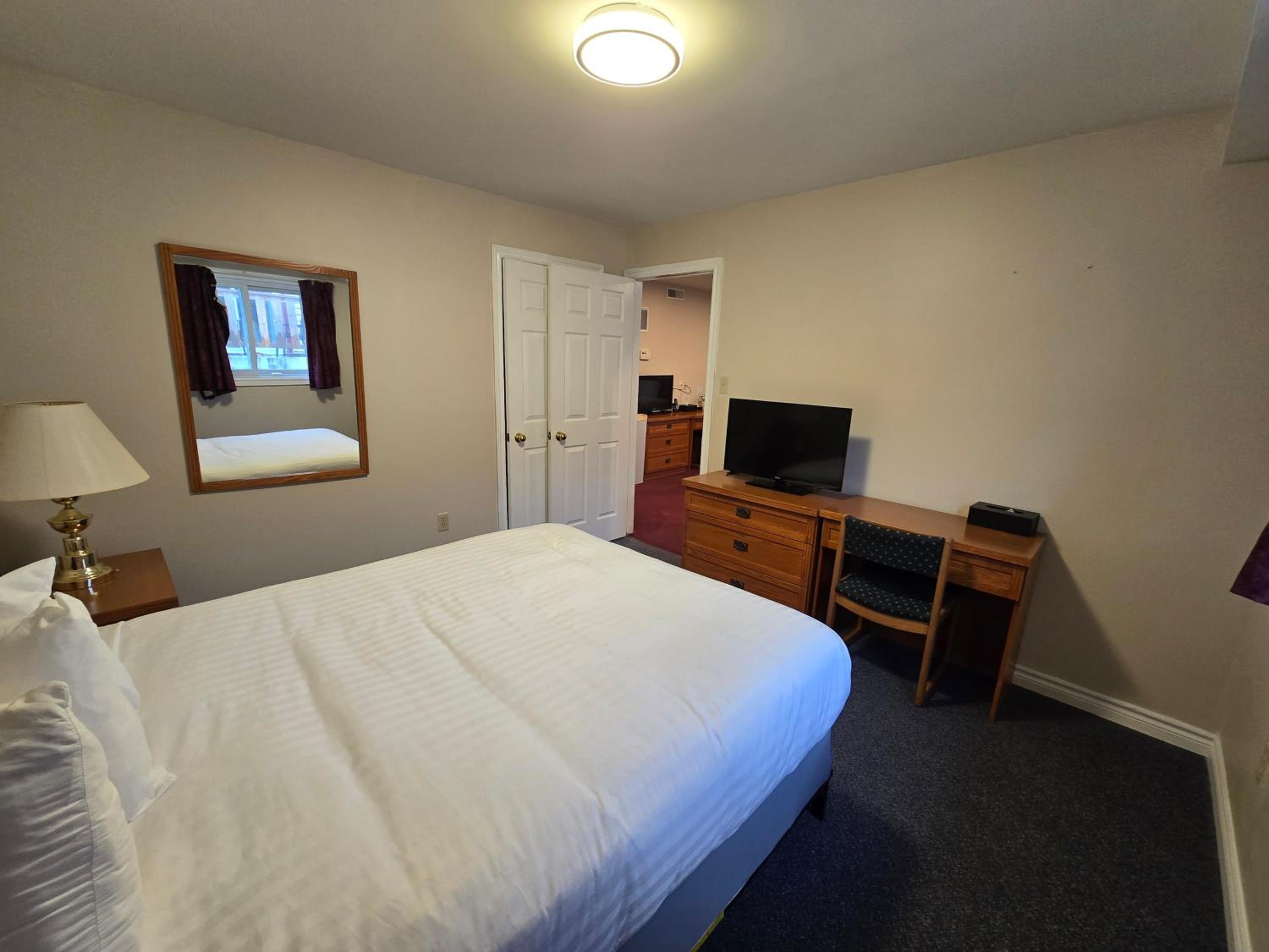 Room with One King and One Queen Bed - Pool Access/Non-Smoking