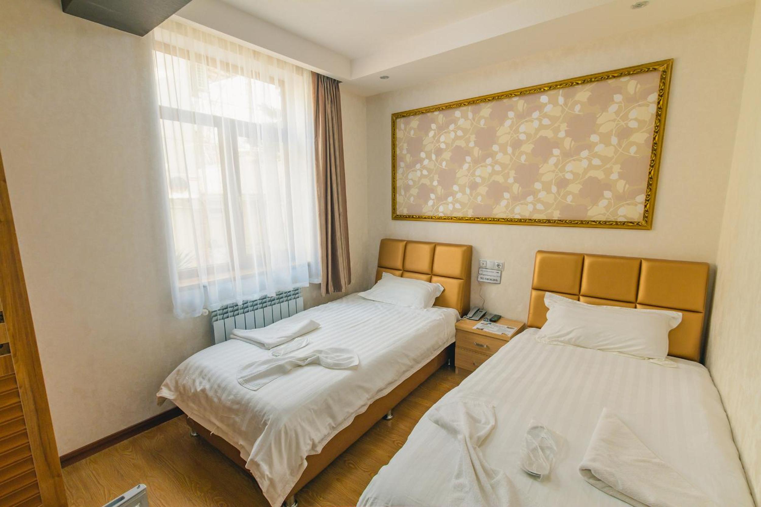 Twin Room - Photo 1