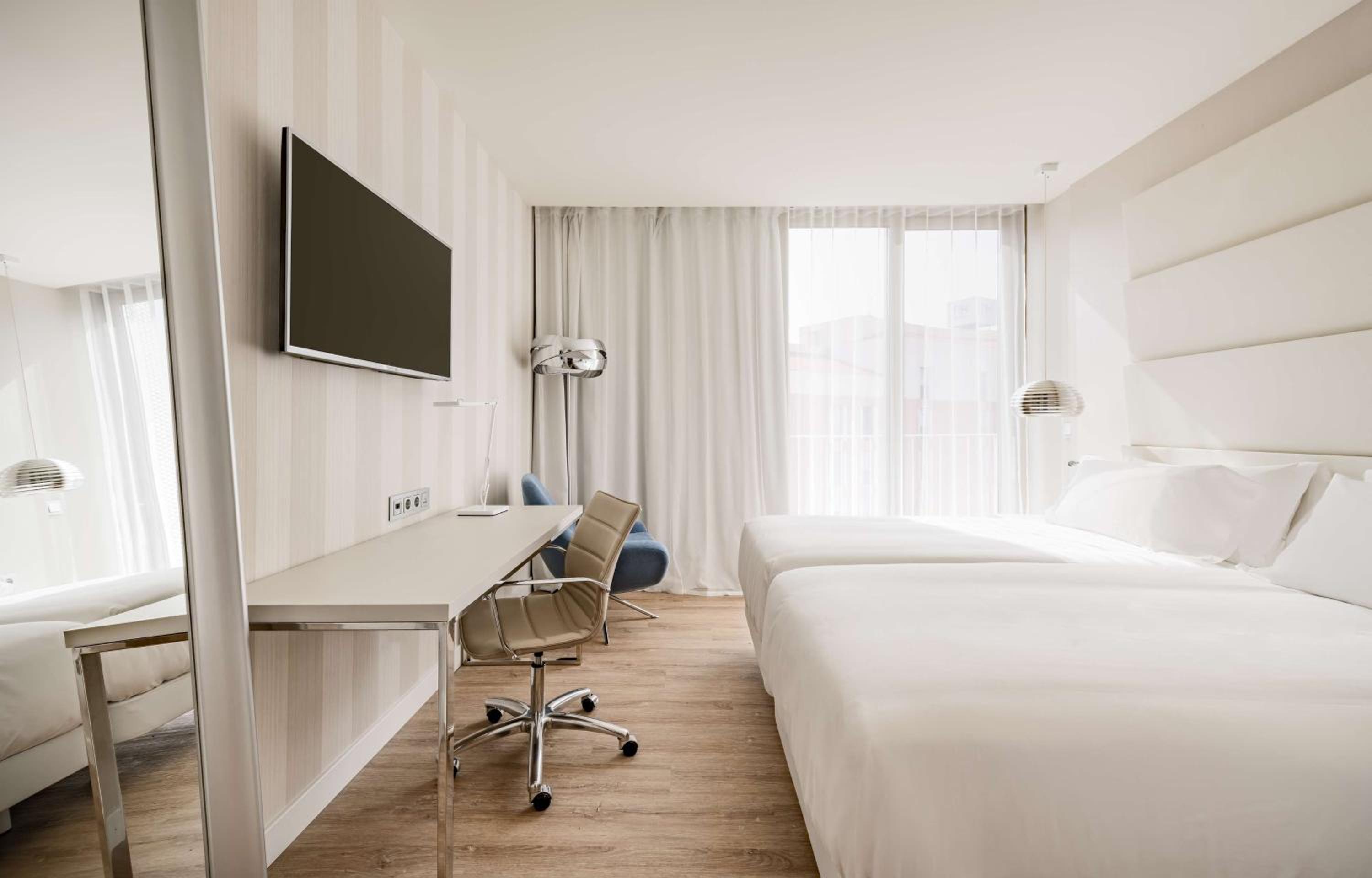 Family Adjoining Room (3 Adults + 1 Child)