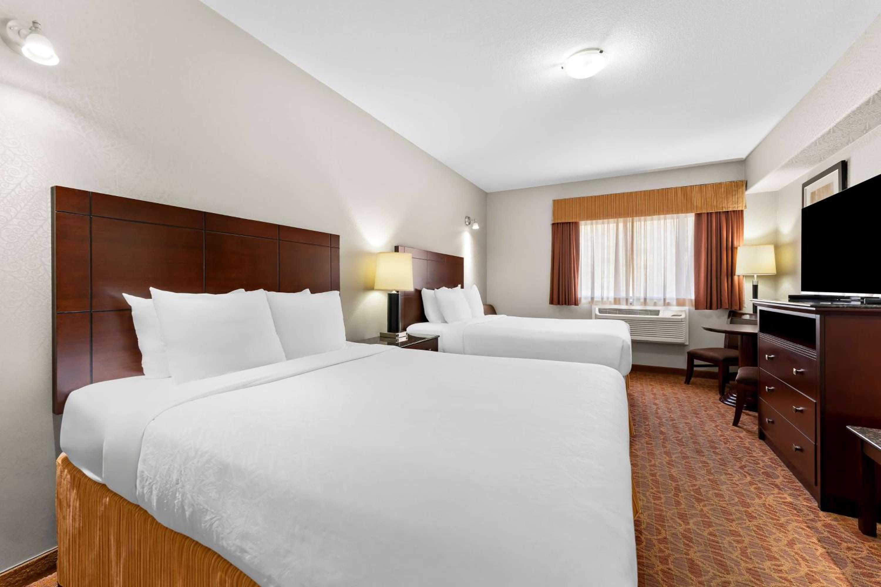 Deluxe Queen Room with Two Queen Beds - Non-Smoking photo 1