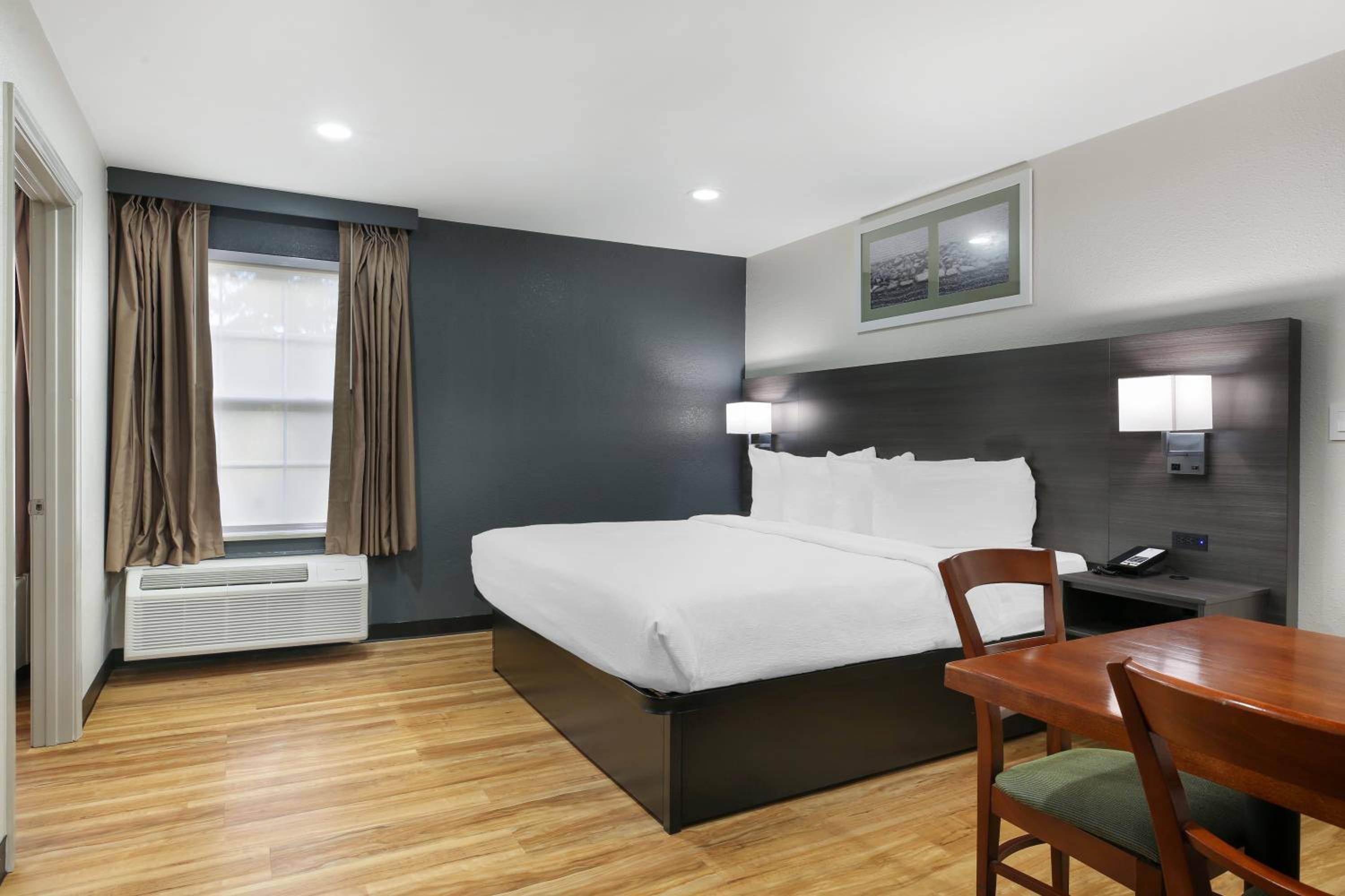 One-Bedroom Family Suite with One King and Two Queen Beds with Sofa Bed - Non-Smoking