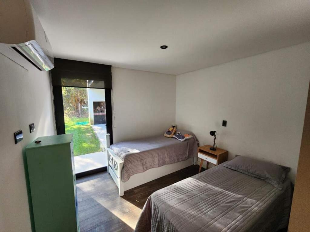 Three-Bedroom House photo 3