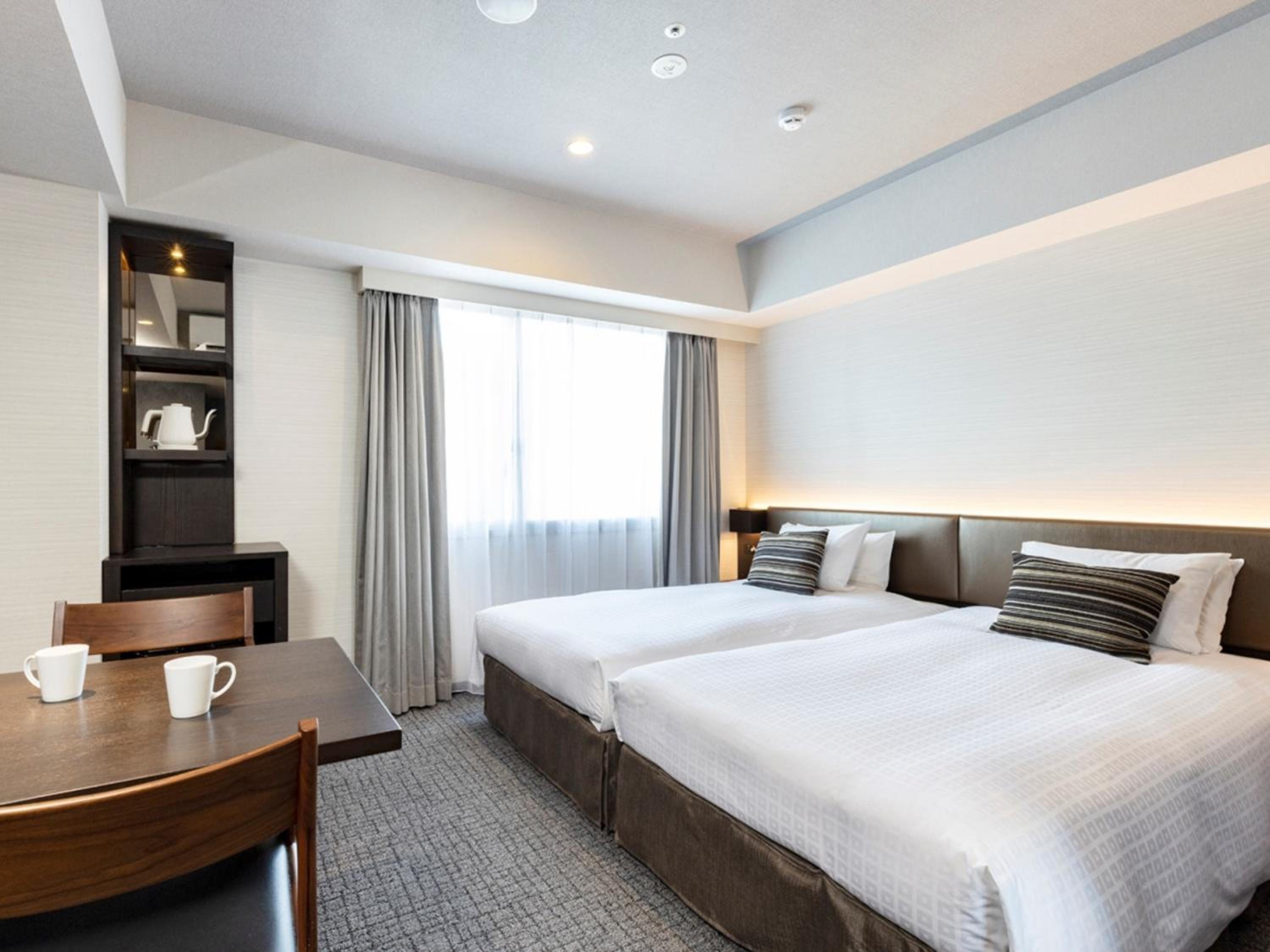 Deluxe Twin Room (1 Adult) - Non-Smoking photo 1