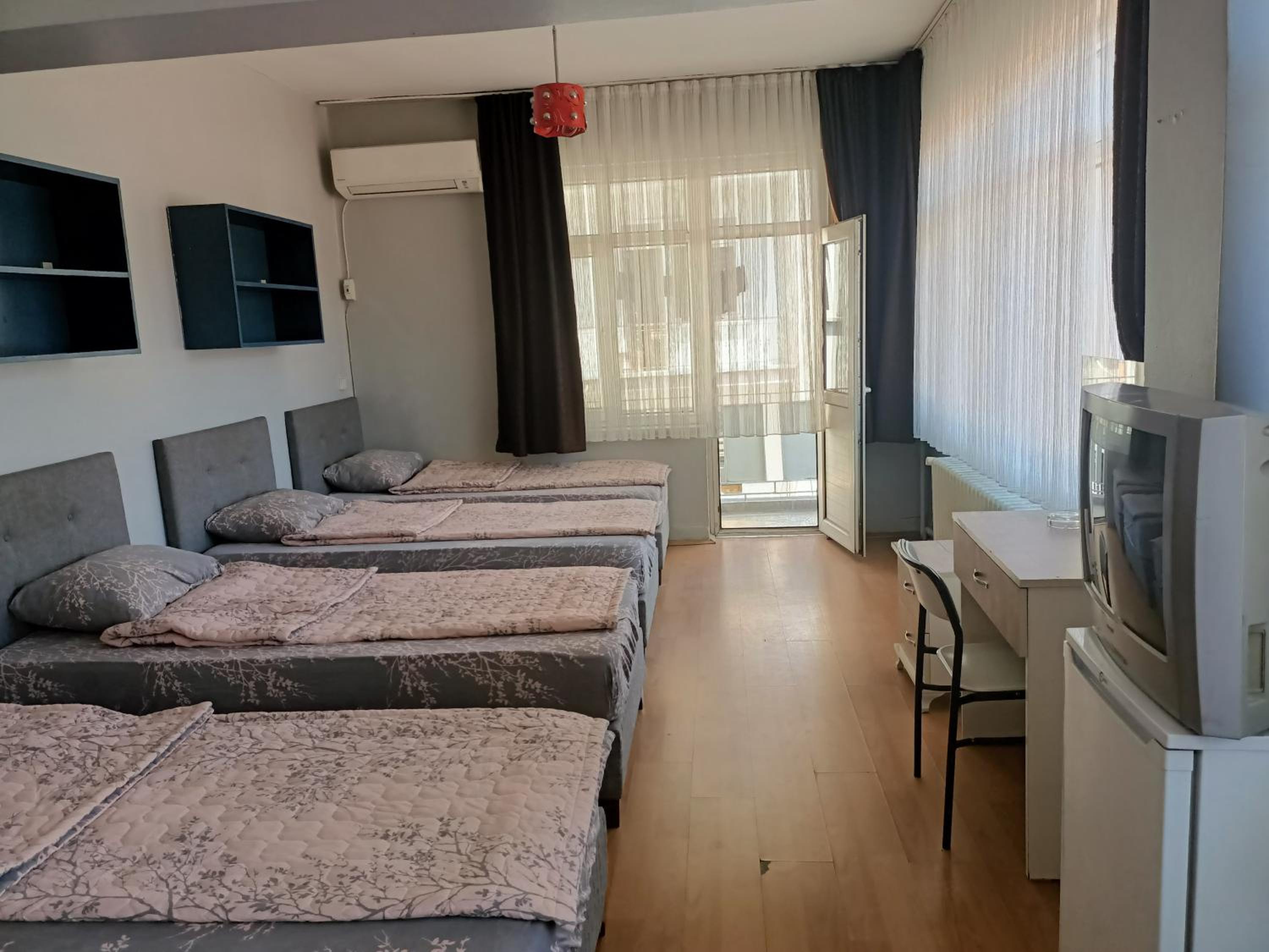 Quadruple Room with Private Bathroom