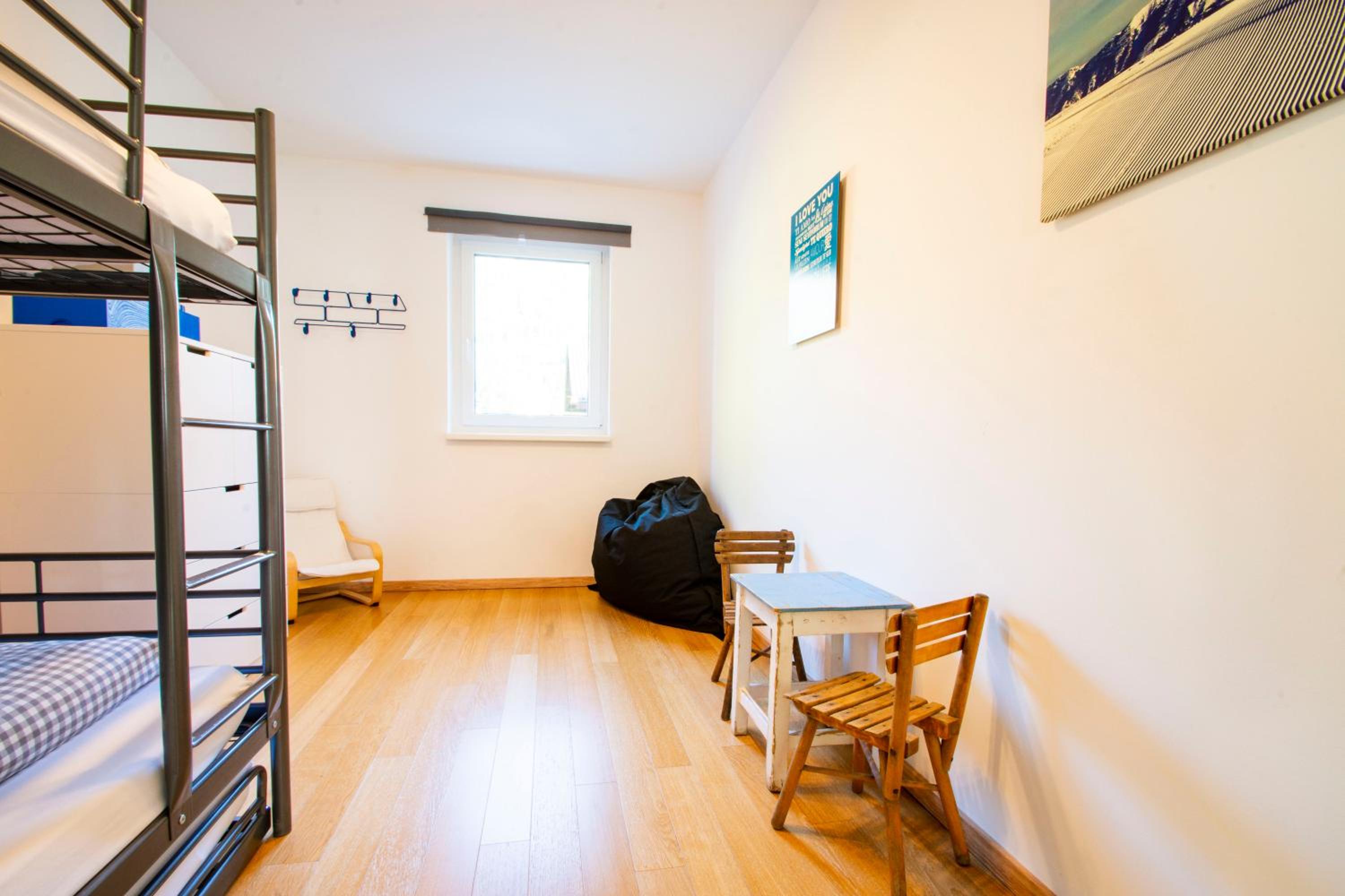 Three-Bedroom Apartment photo 2