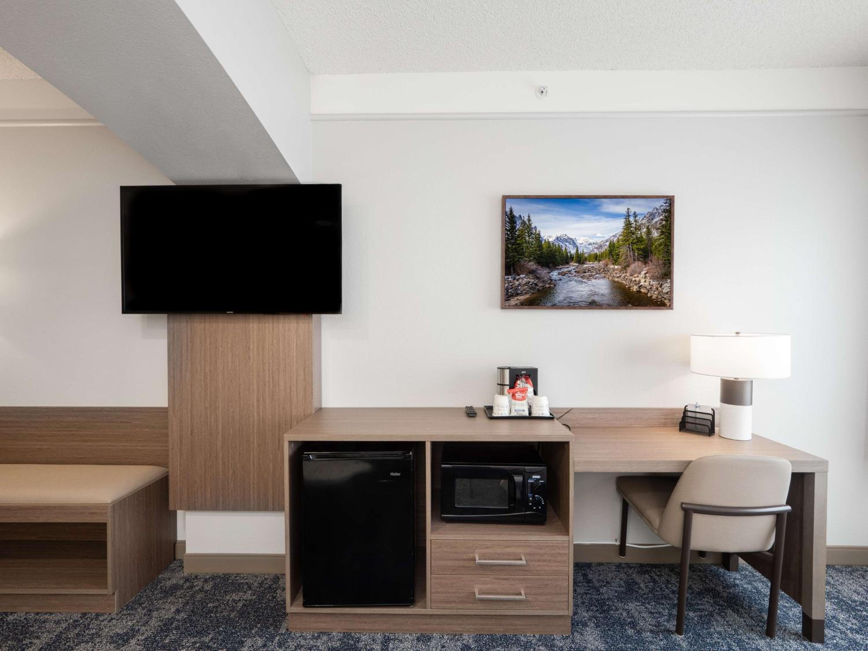 Larger Room with One King and One Queen Bed and Sofa - Non-Smoking - Photo 1