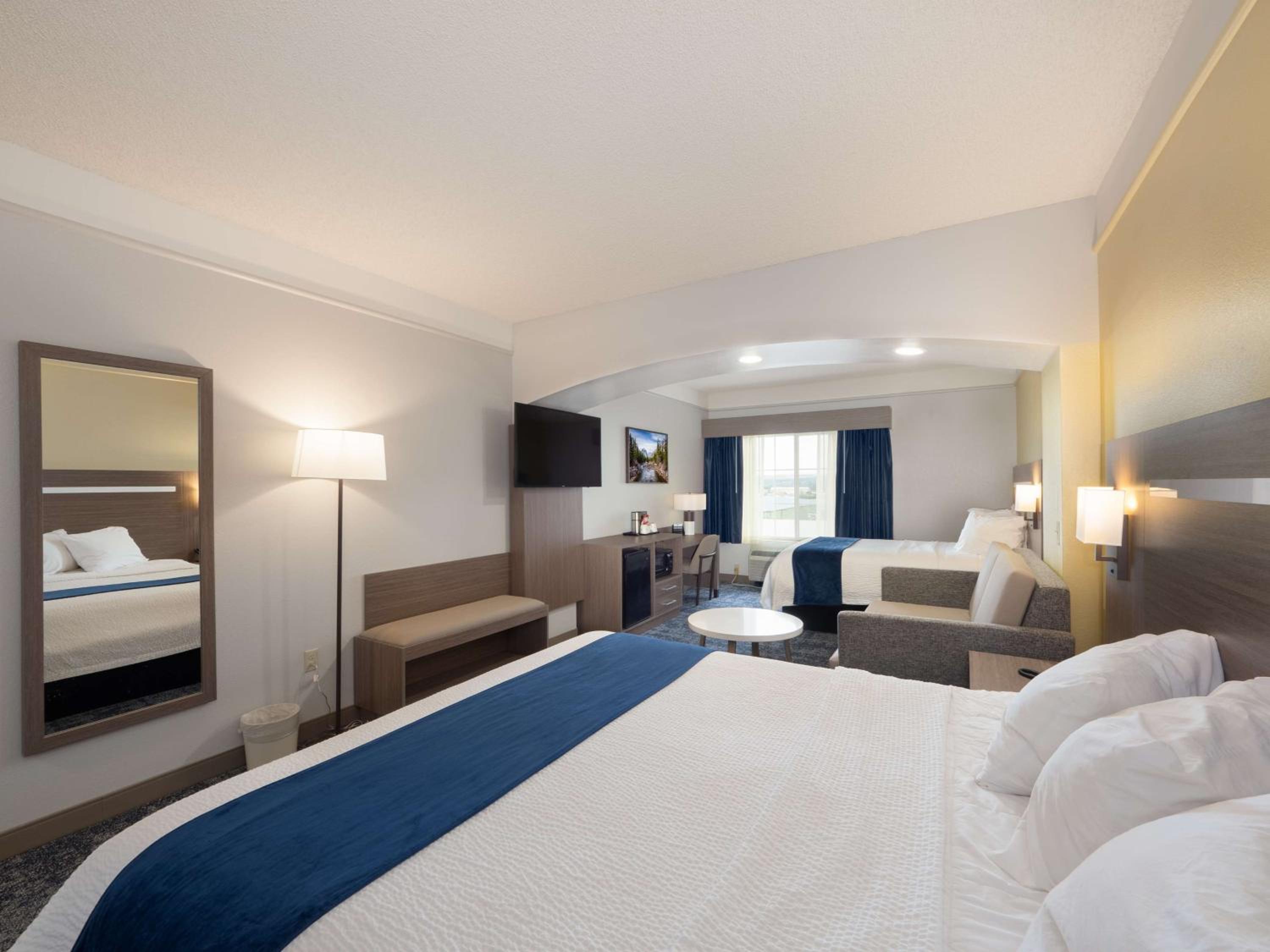 Larger Room with One King and One Queen Bed and Sofa - Non-Smoking - Photo 5