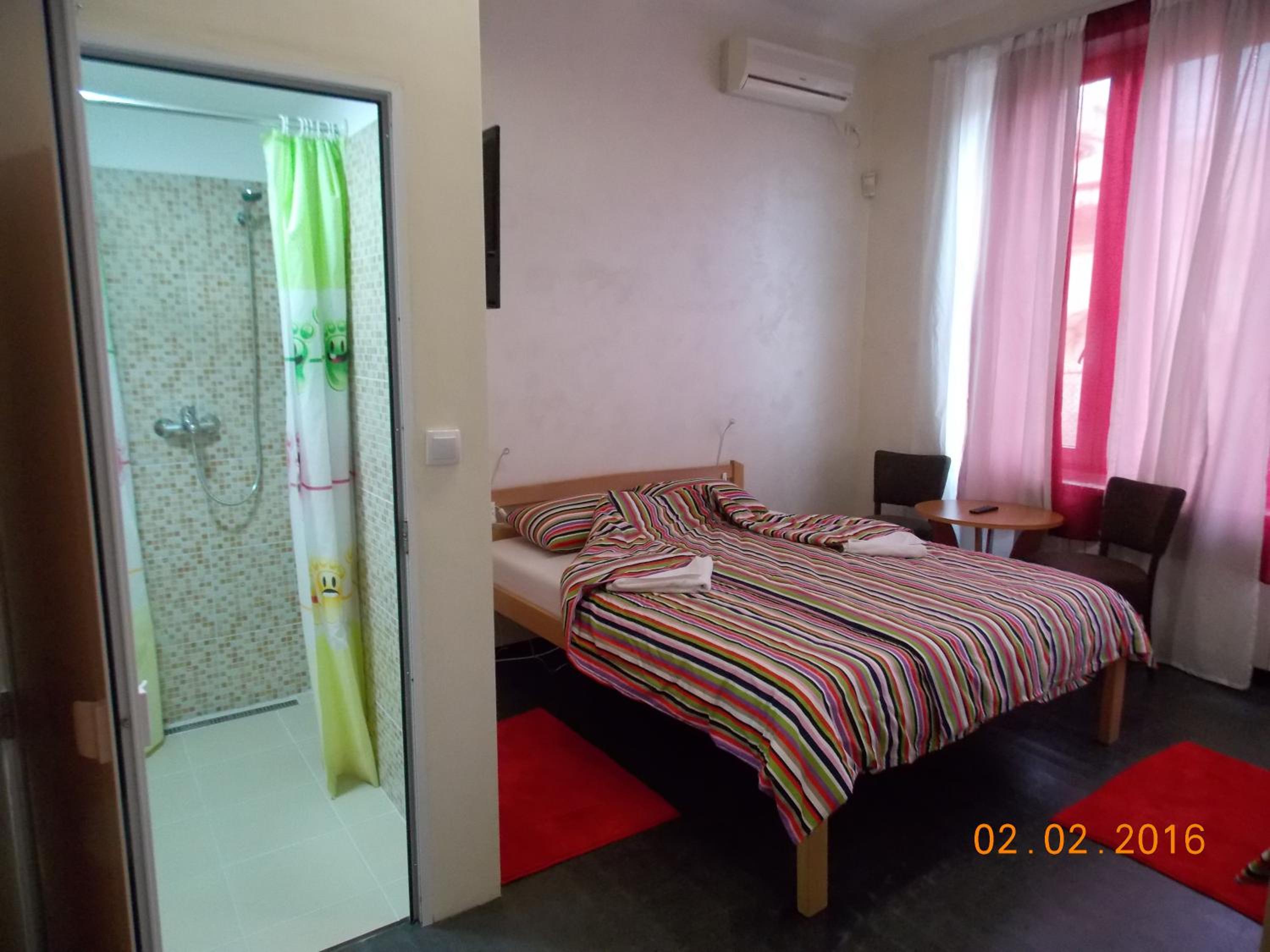 Standard Triple Room with Private Bathroom