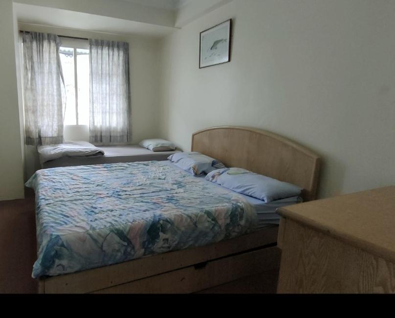 Three-Bedroom Apartment photo 2