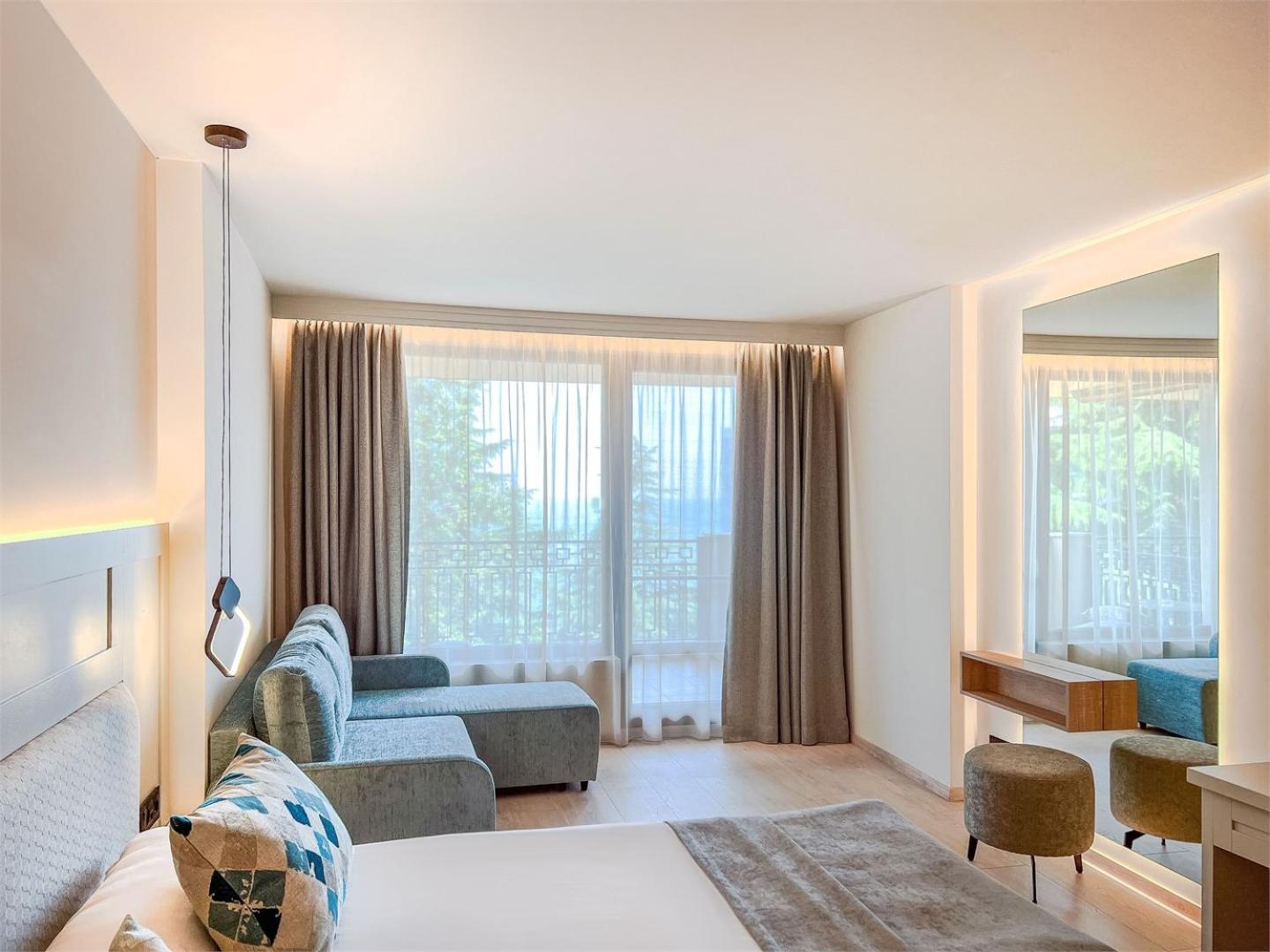 Double Standard Room (2 adults+2 children) with unlimited access to Calma SPA Center photo 3
