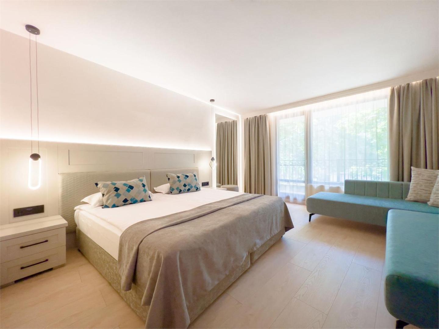 Double Standard Room (2 adults+2 children) with unlimited access to Calma SPA Center photo 2
