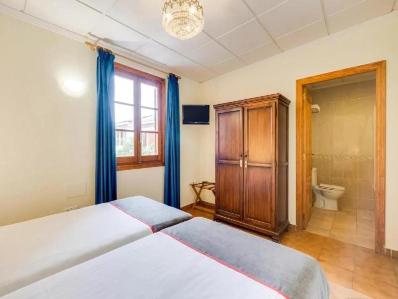 Habitación Estándar con Dos Camas Individuales