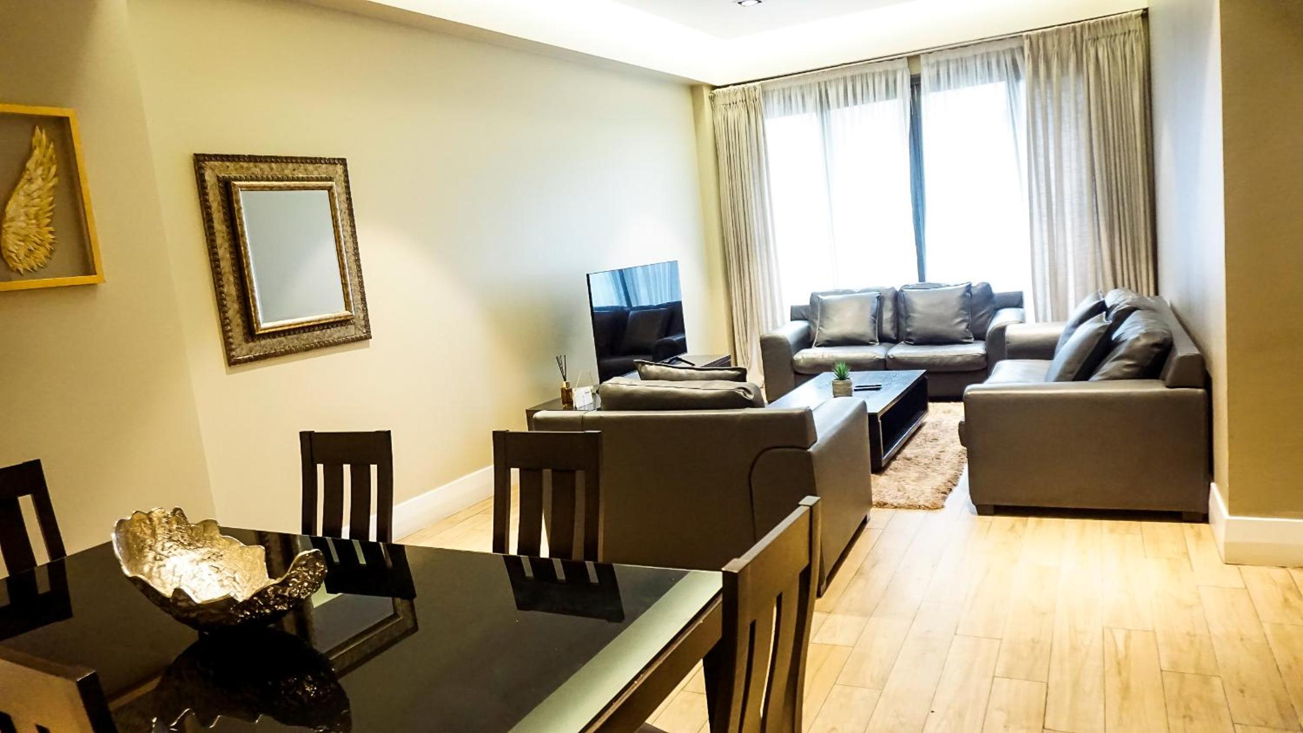 Three-Bedroom Apartment photo 1