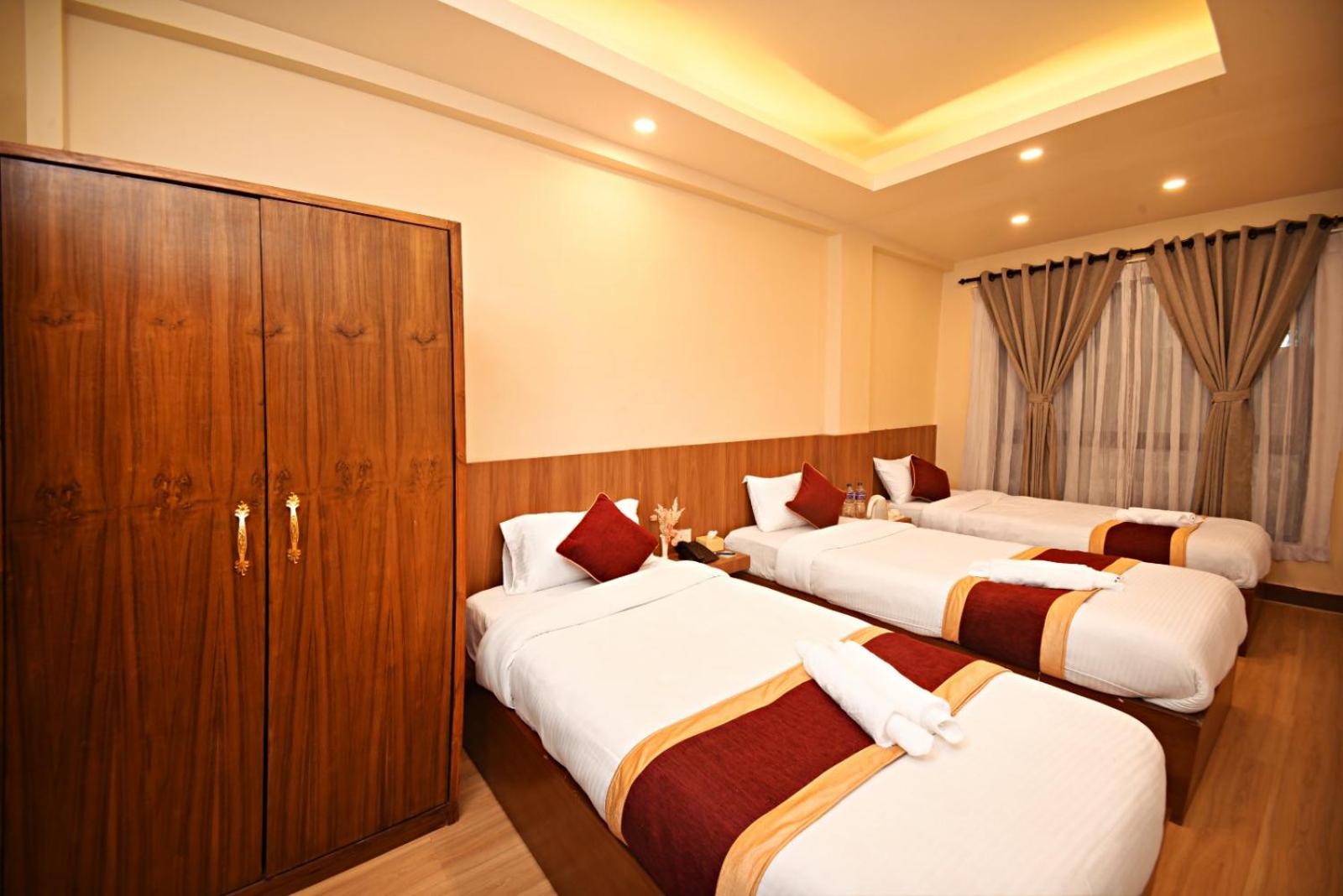 Deluxe Triple Room