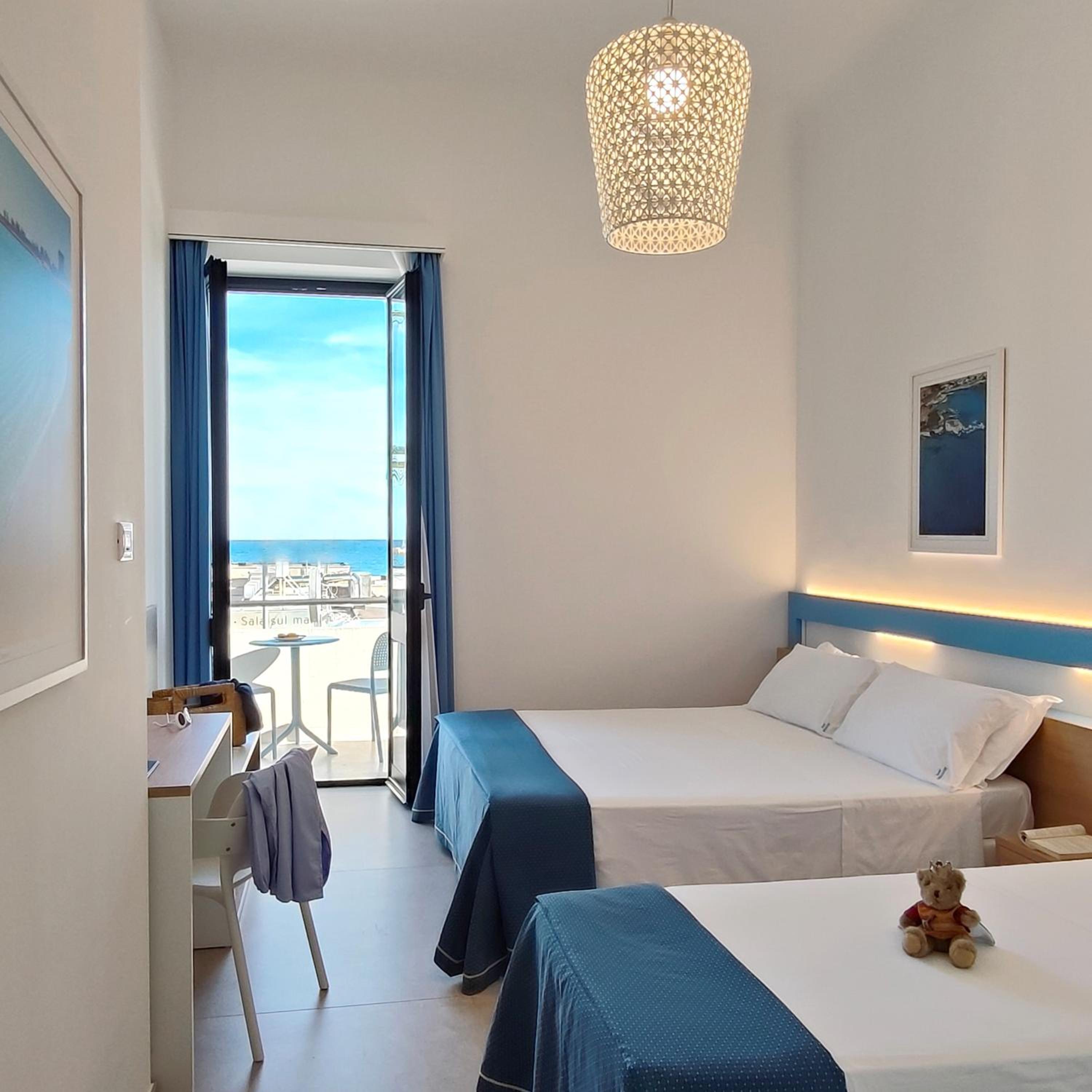 Triple Room with Balcony and Sea View