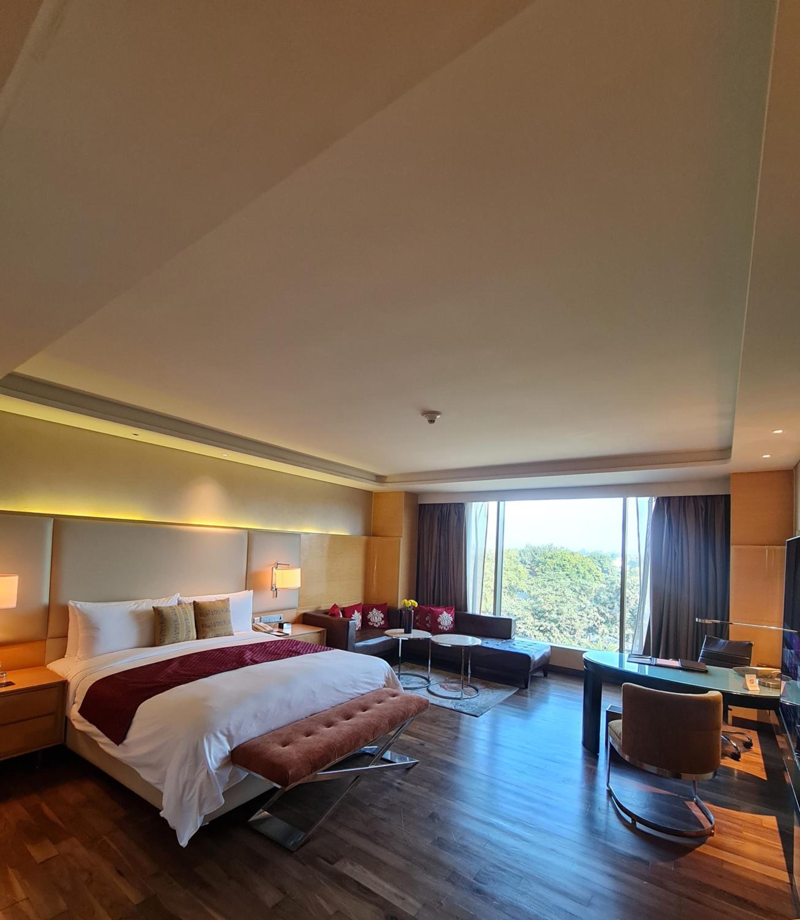 Studio King with complimentary Breakfast & Club access with unlimited IMFL Beverages 5PM to 7PM. INR 2,000 Credit on select hotel services