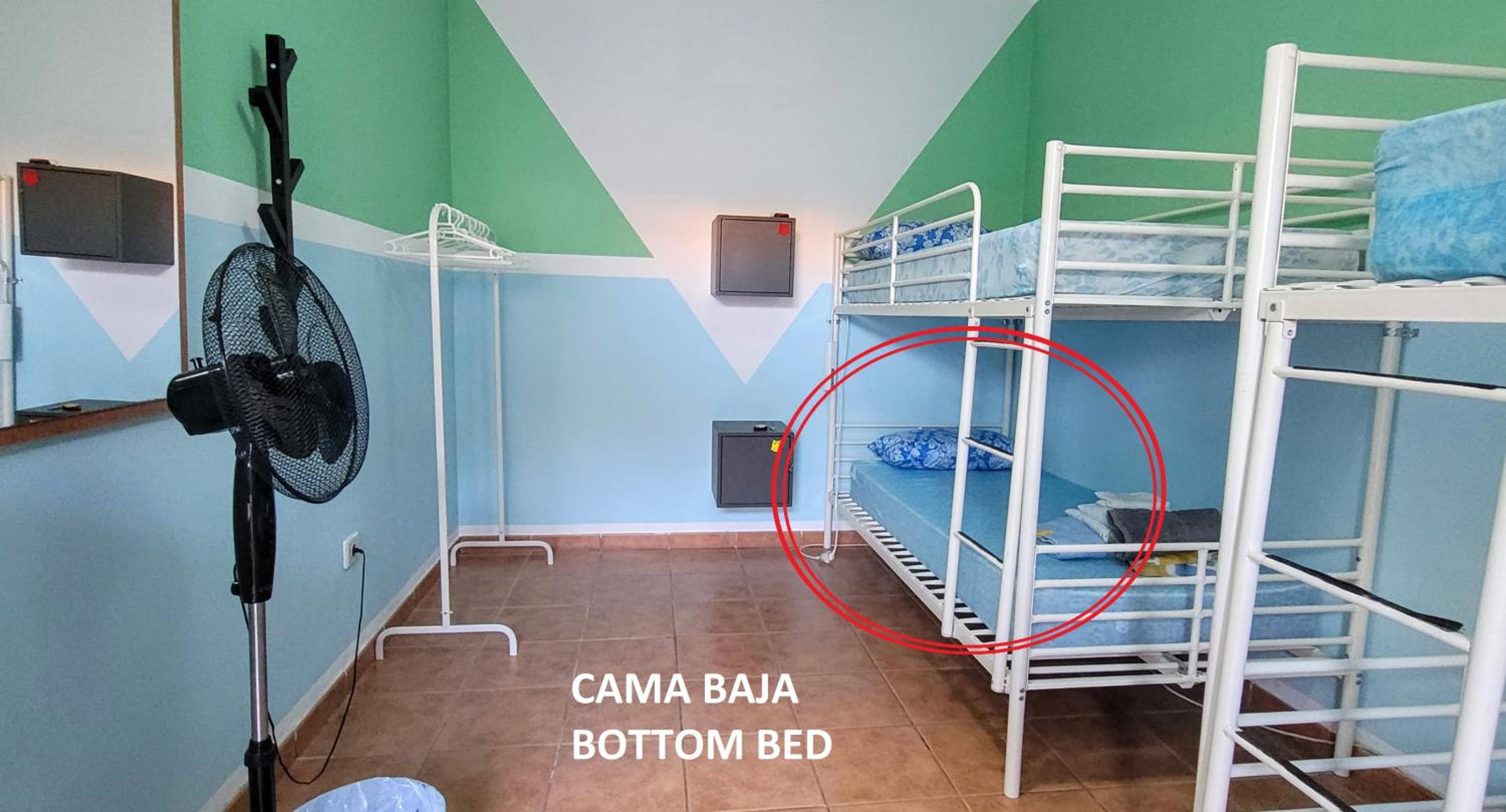 Cama individual en habitación compartida mixta