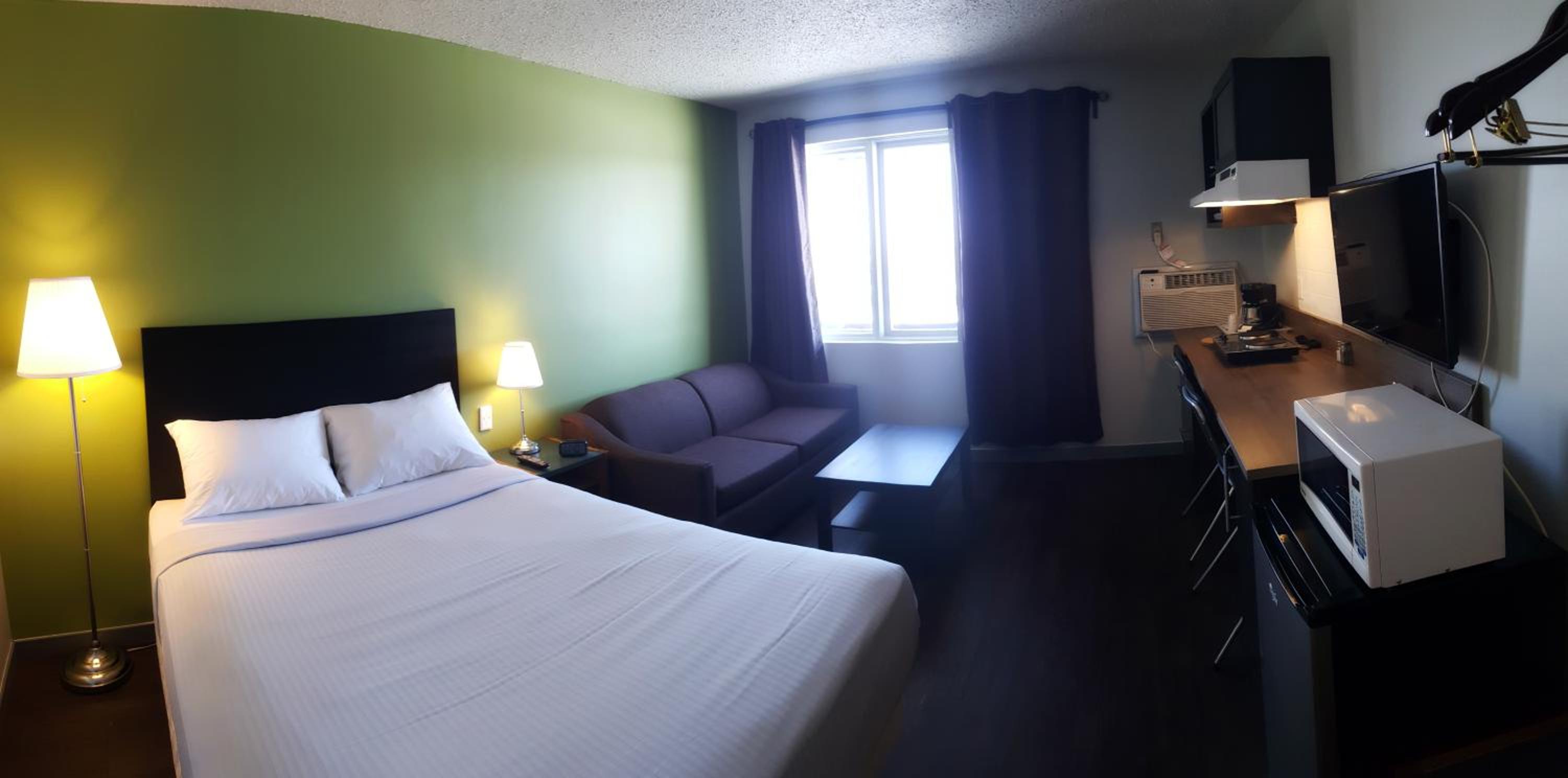 Queen Room with Kitchenette and Sofa Bed