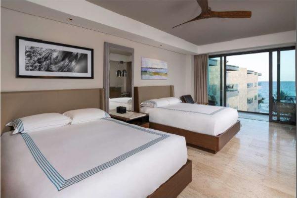 Queen Room with Two Queen Beds and Partial Ocean View - Beach House