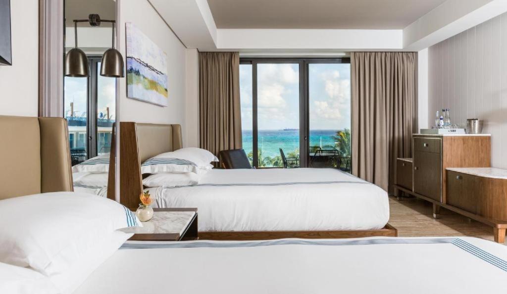 Queen Room with Two Queen Beds and Partial Ocean View - Beach House