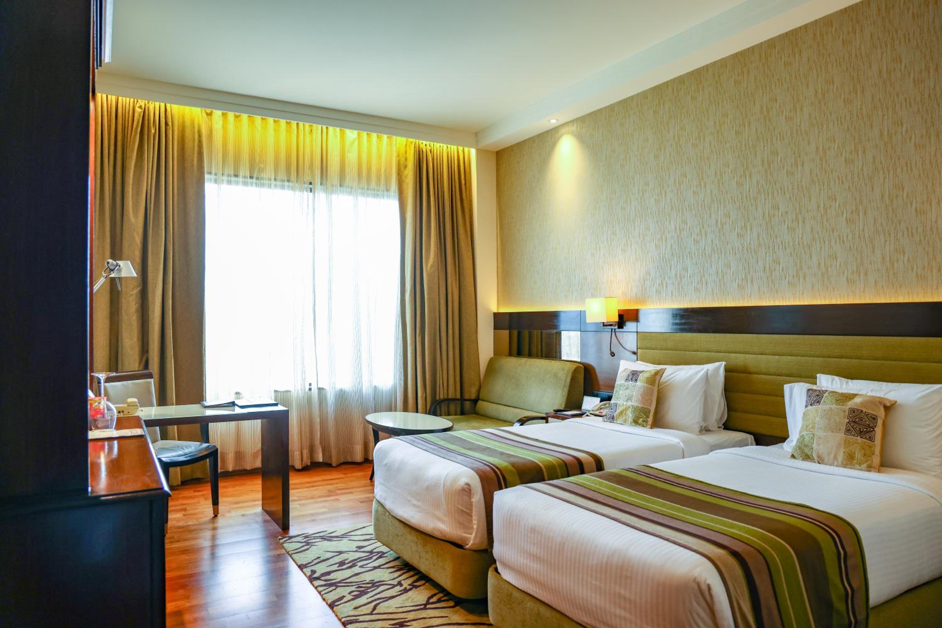 Deluxe Double or Twin Room with City View - 15% off on session of Spa, 15% off on Laundry, 15% off F&B services