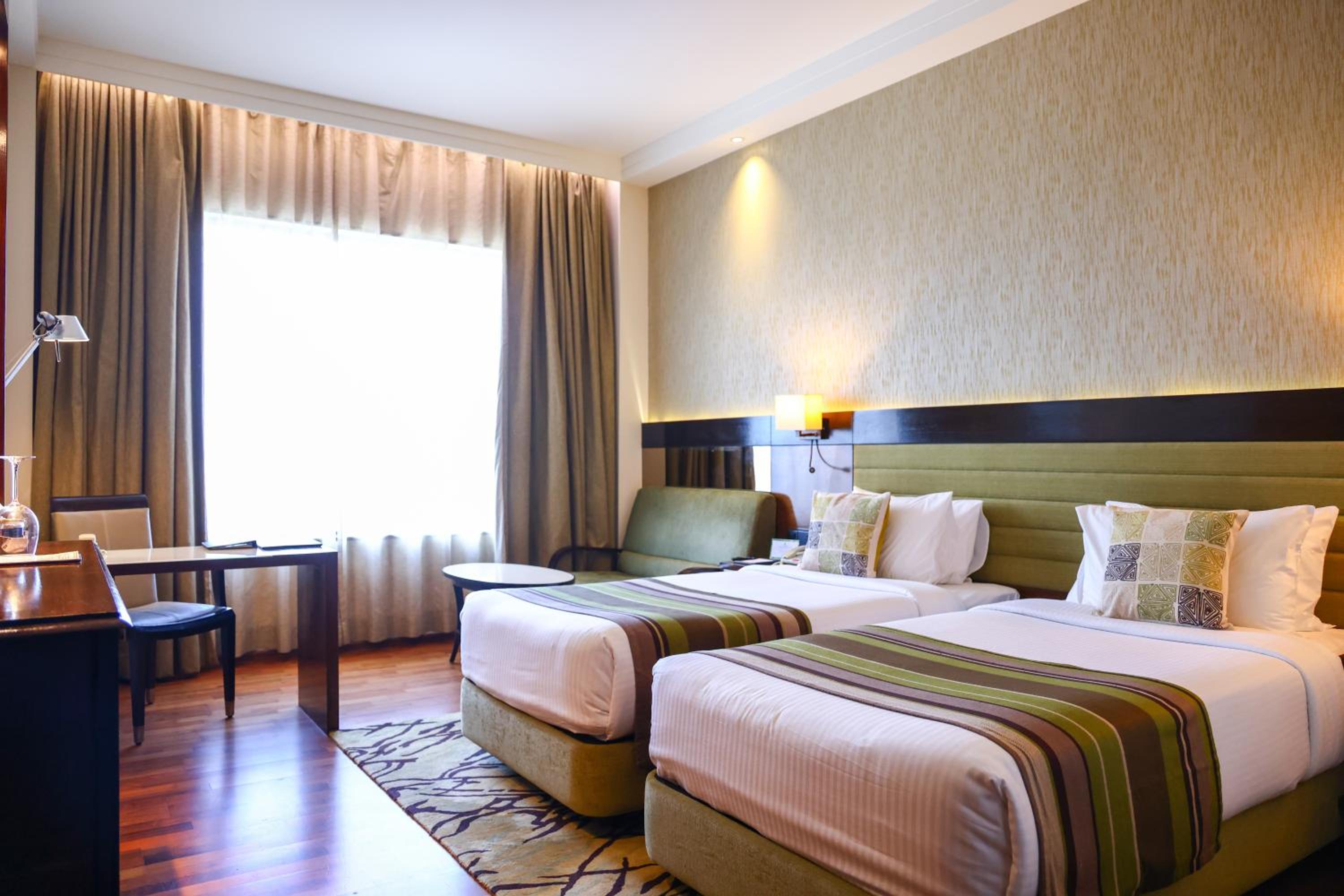 Deluxe Double or Twin Room with City View - 15% off on session of Spa, 15% off on Laundry, 15% off F&B services