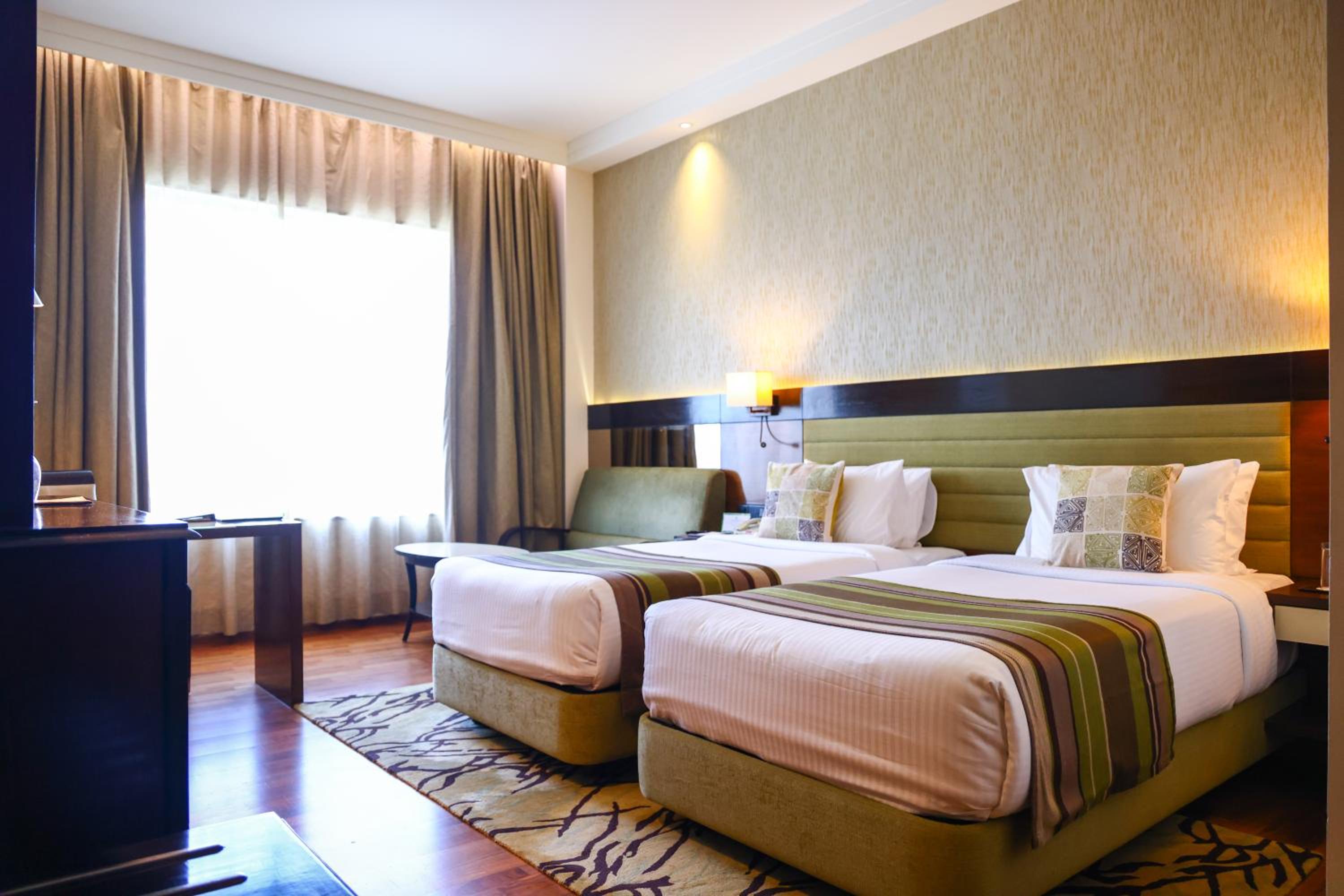 Deluxe City View Room - 2 Twin Beds - 15% off on session of Spa, 15% off on Laundry, 15% off F&B services