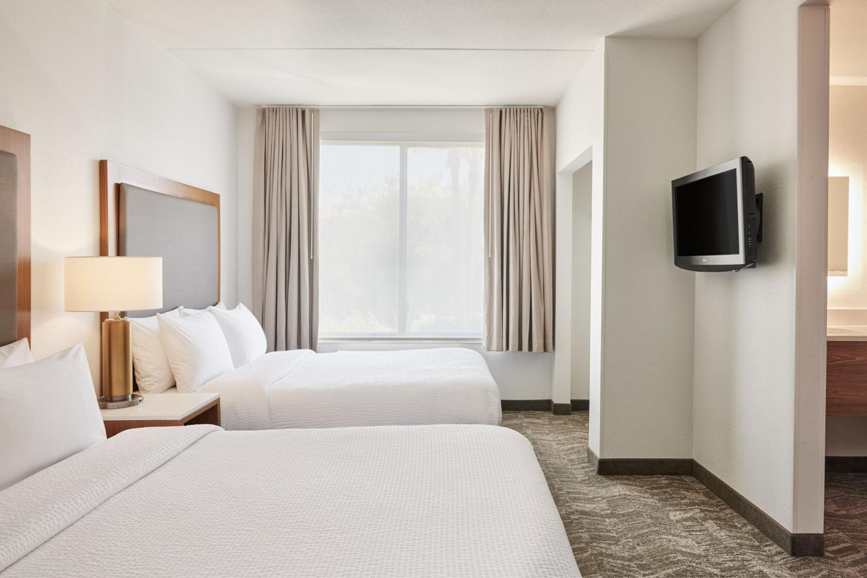 Queen Suite with Two Queen Beds and Trundle Sofa - Photo 6