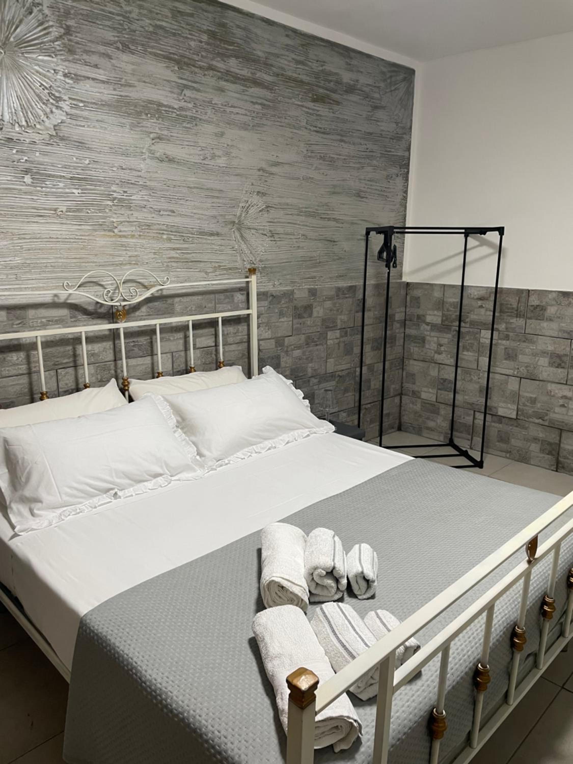 Economy Quadruple Room with Shared Bathroom