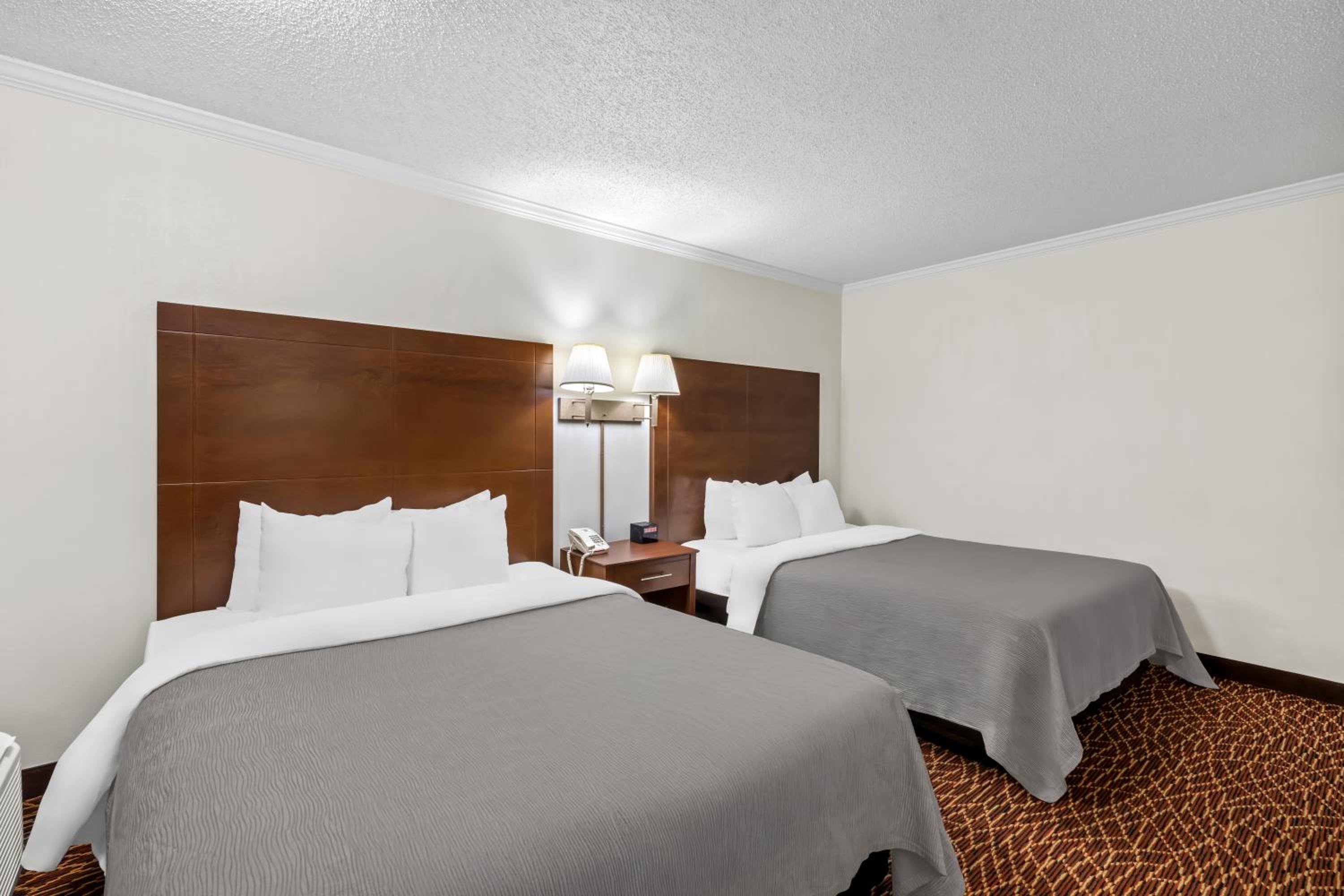 Quadruple Room with Two Queen Beds - Smoking/Interior Hall/Pet Friendly photo 1