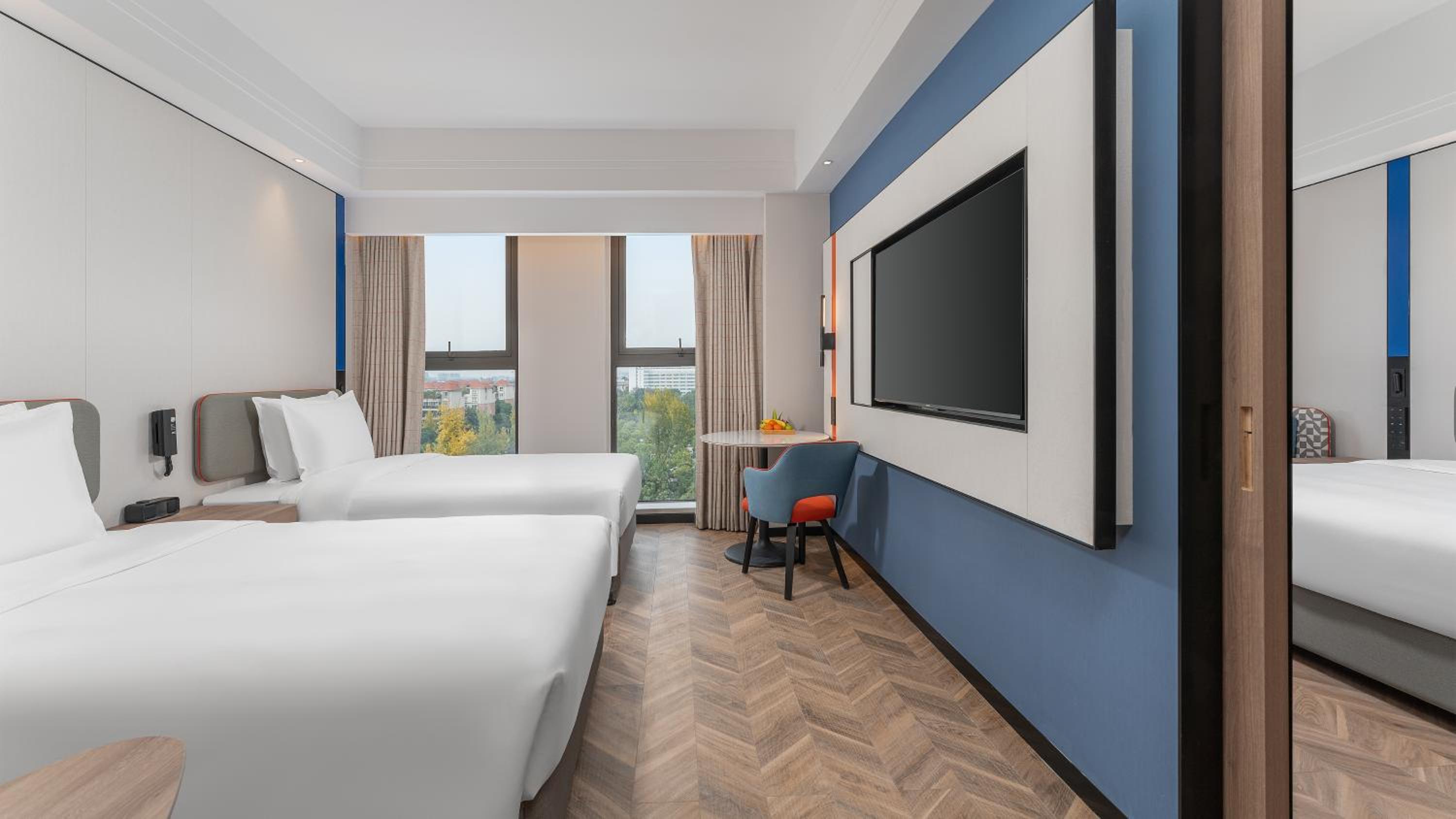 Standard Room with One King and Two Double Beds