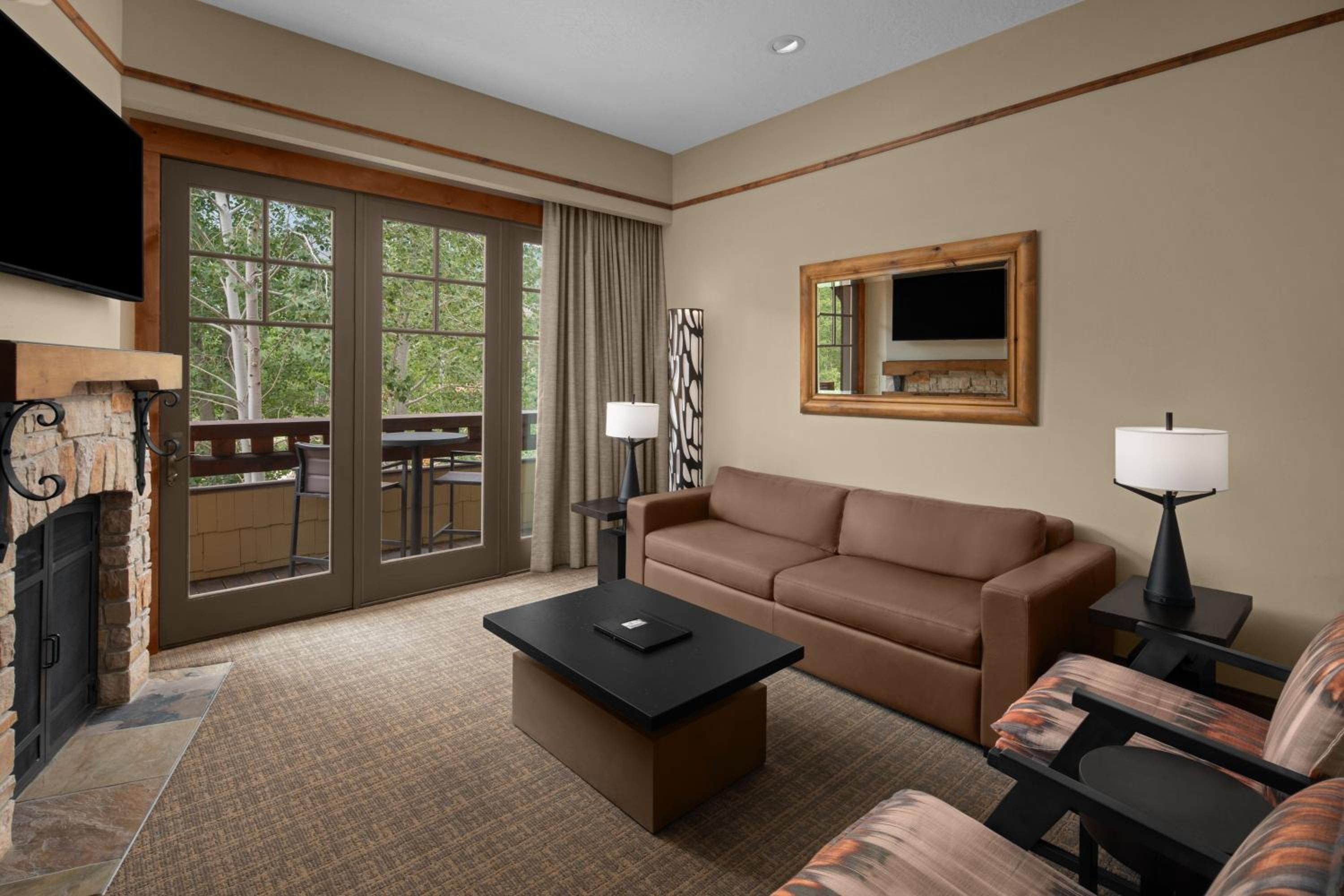 Executive King Suite with Sofa Bed and Mountain or Golf View - Mobility and Hearing Accessible with Roll-in Shower