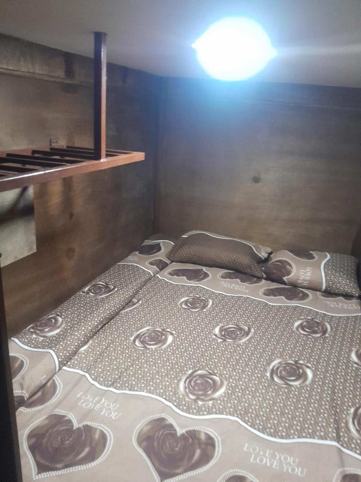 Single Bed in Dormitory Room